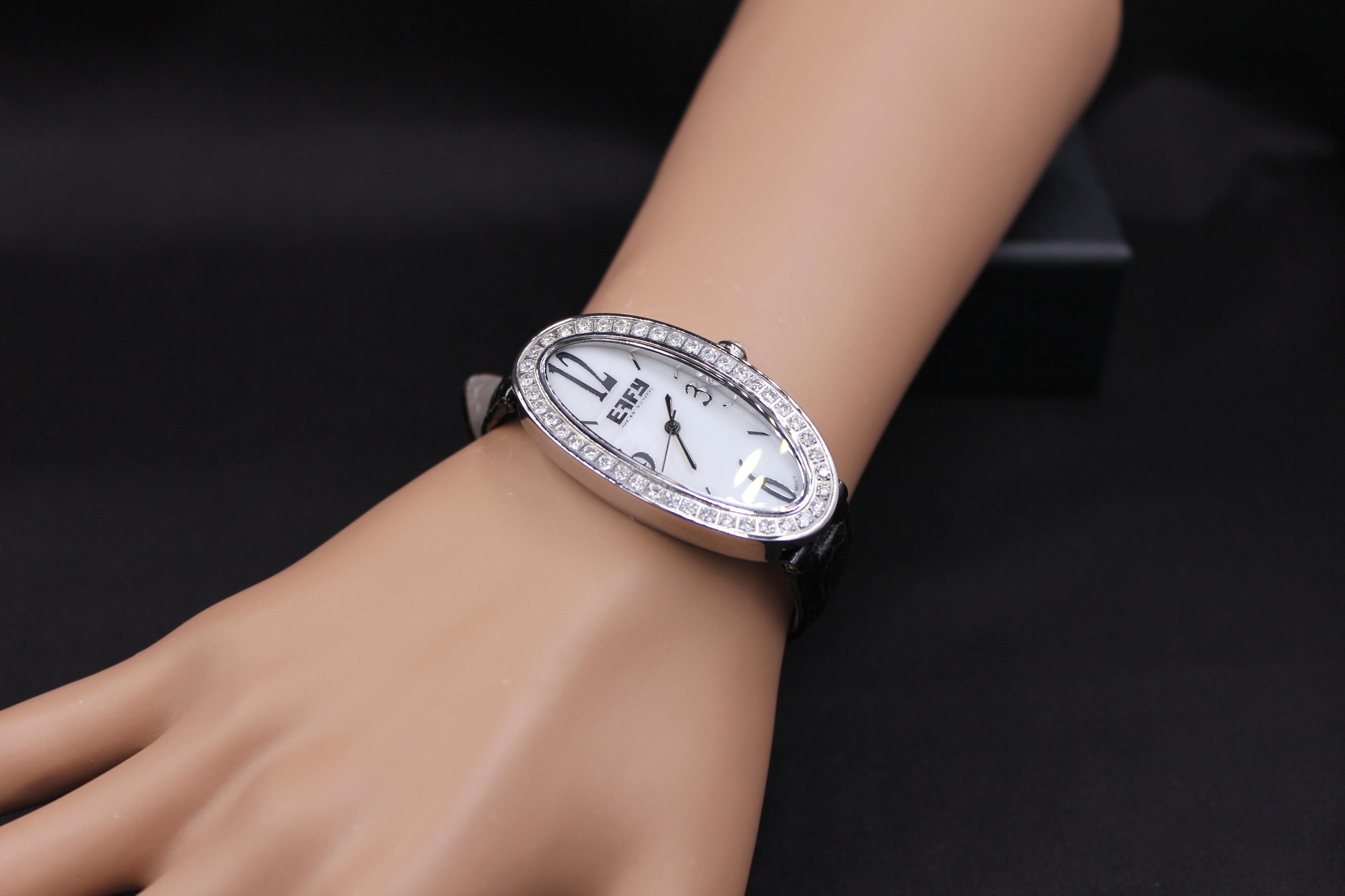 ·          Quality Swiss-Quartz movement guarantees precision timing
·         Mother-of-Pearl dial micro-paved with diamonds and gemstones enhances any dress style
·         Scratch-resistant sapphire glass lens
·         Genuine exotic crocodile