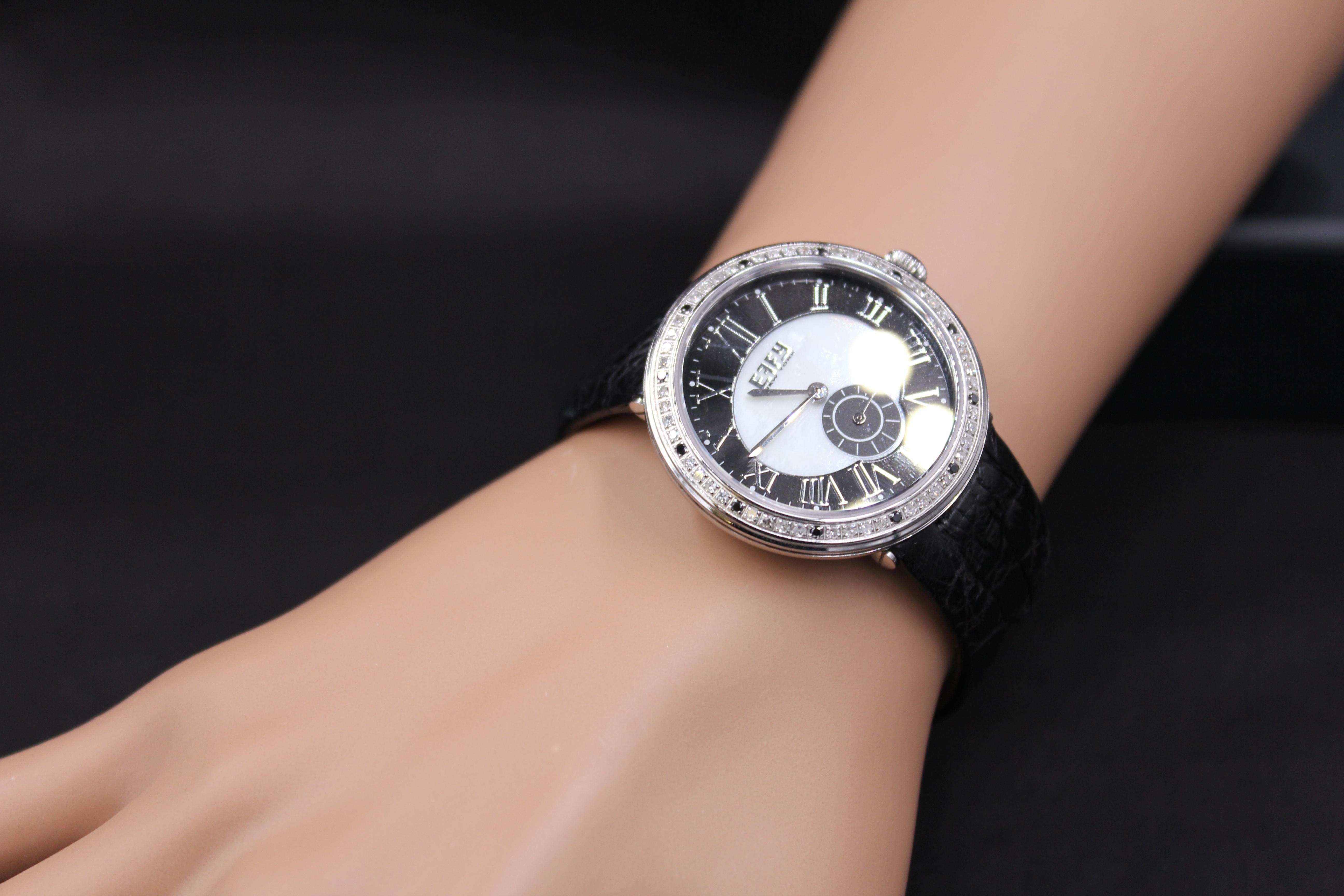·  Quality Swiss-Quartz movement guarantees precision timing
·         Mother-of-Pearl dial micro-paved with diamonds and gemstones enhances any dress style
·         Scratch-resistant sapphire glass lens
·         Genuine exotic leather strap or