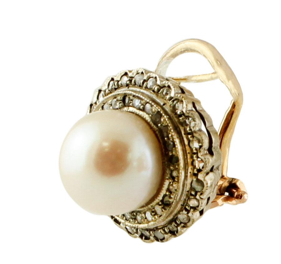Elegant retro stud earrings in 9k rose gold and silver structure, mounted with central south sea pearl and a round silver frame studded with little diamonds. 
These earrings are totally handmade by Italian master goldsmiths
Diamonds 0.5 ct
Pearls
