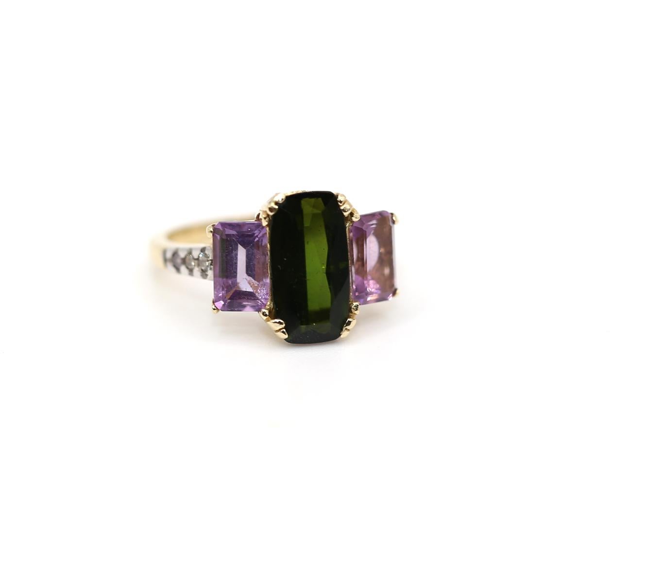 Diamonds Peridot Amethyst Suffragist Ring 14K Yellow Gold, 1890
Antique Diamonds, Peridot, and Amethyst Suffragist Ring in 14K Yellow Gold, c.1970
A fine and stylish antique ring of historical significance, crafted in 14K yellow gold. Its strict