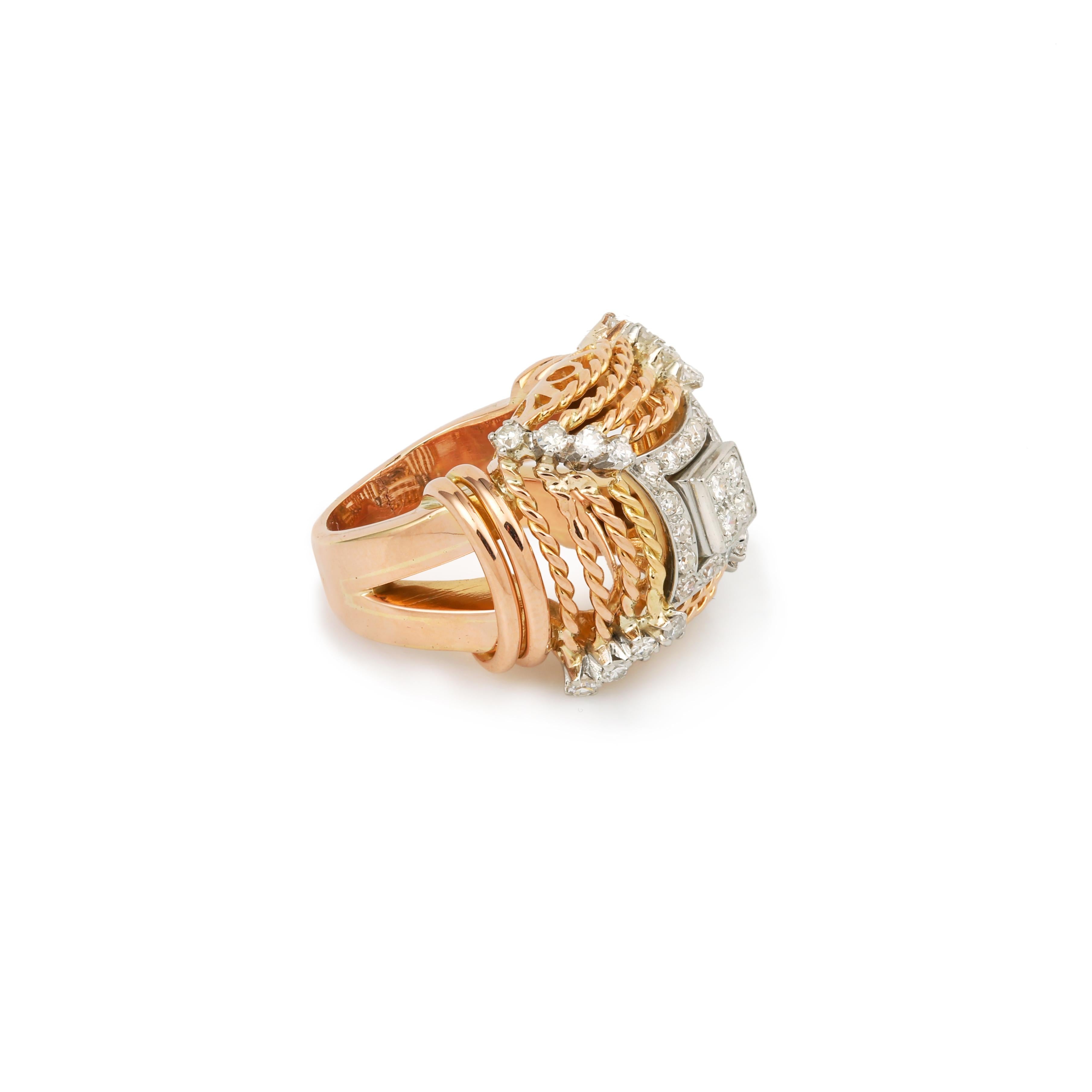 Imposing pink gold ring with a twisted motif, gadrooned shoulders and pavé diamonds.

Estimated total diamond weight: 0.70 carats

Dimensions: 18.25 x 23.97 x 10.96 mm (0.718 x 0.944 x 0.427 inch)

Finger size: 52 (US: 6)

Ring weight: 12.6