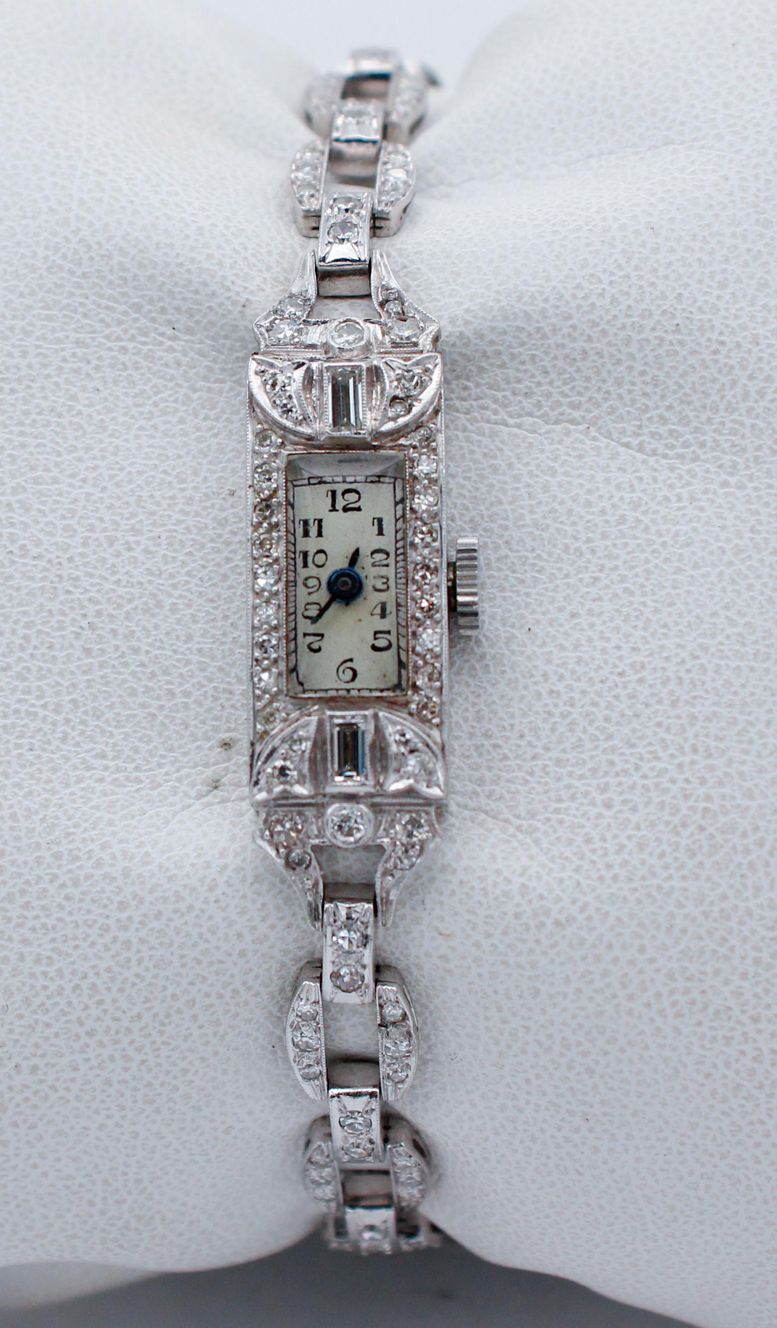 Elegant bracelet/wrist watch in platinum structure studded with diamonds.
The origin of this bracelet goes back to the 1970s and it is in perfect condition.
Diamonds 2.00 ct
Total Weight 19.00
RF   +ORIF
Lenght 17.5 cm

For any inquiries, please