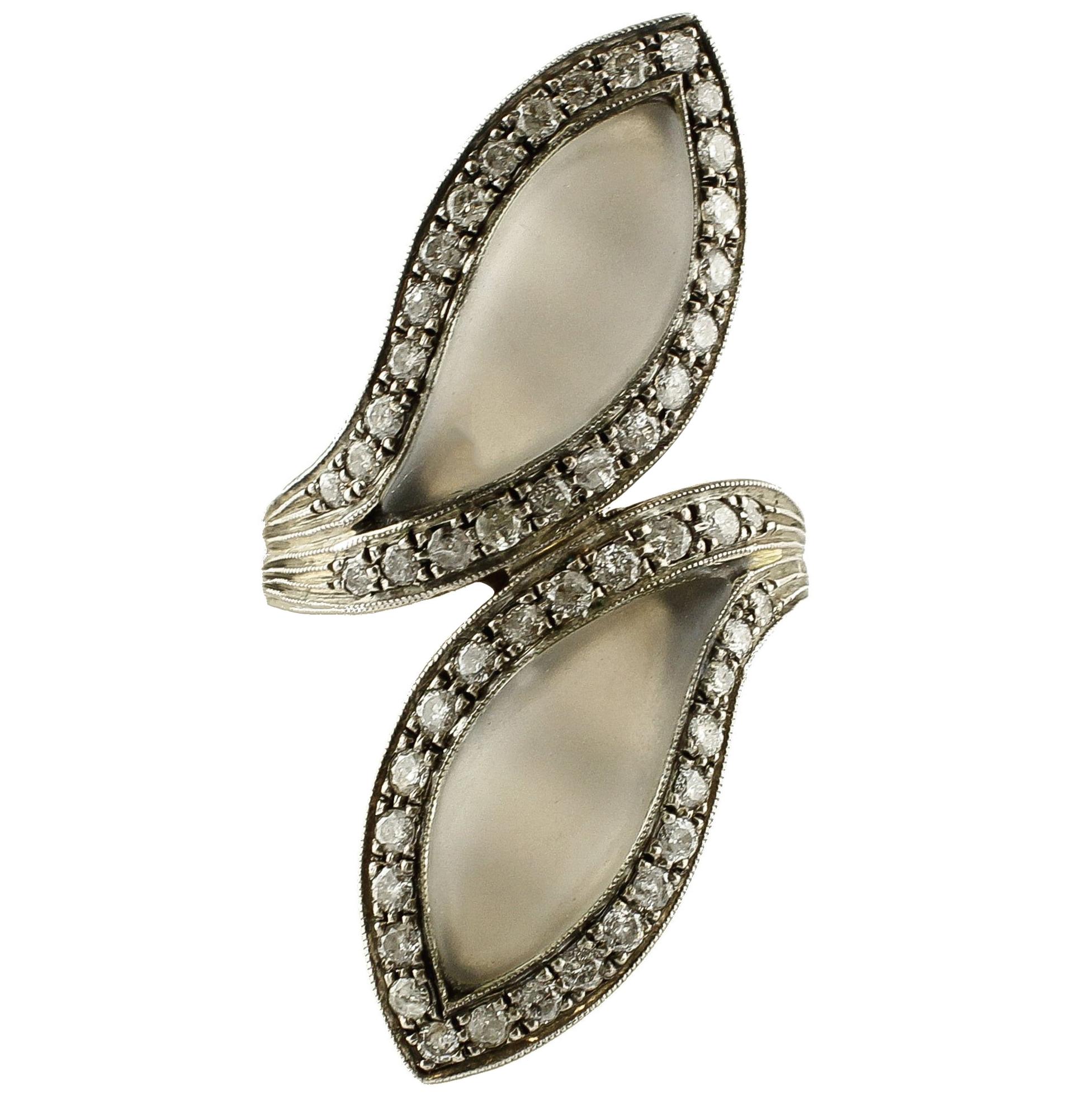Diamonds, Rock Crystal, 14 Kt Rose Gold and Silver Fashion Ring.