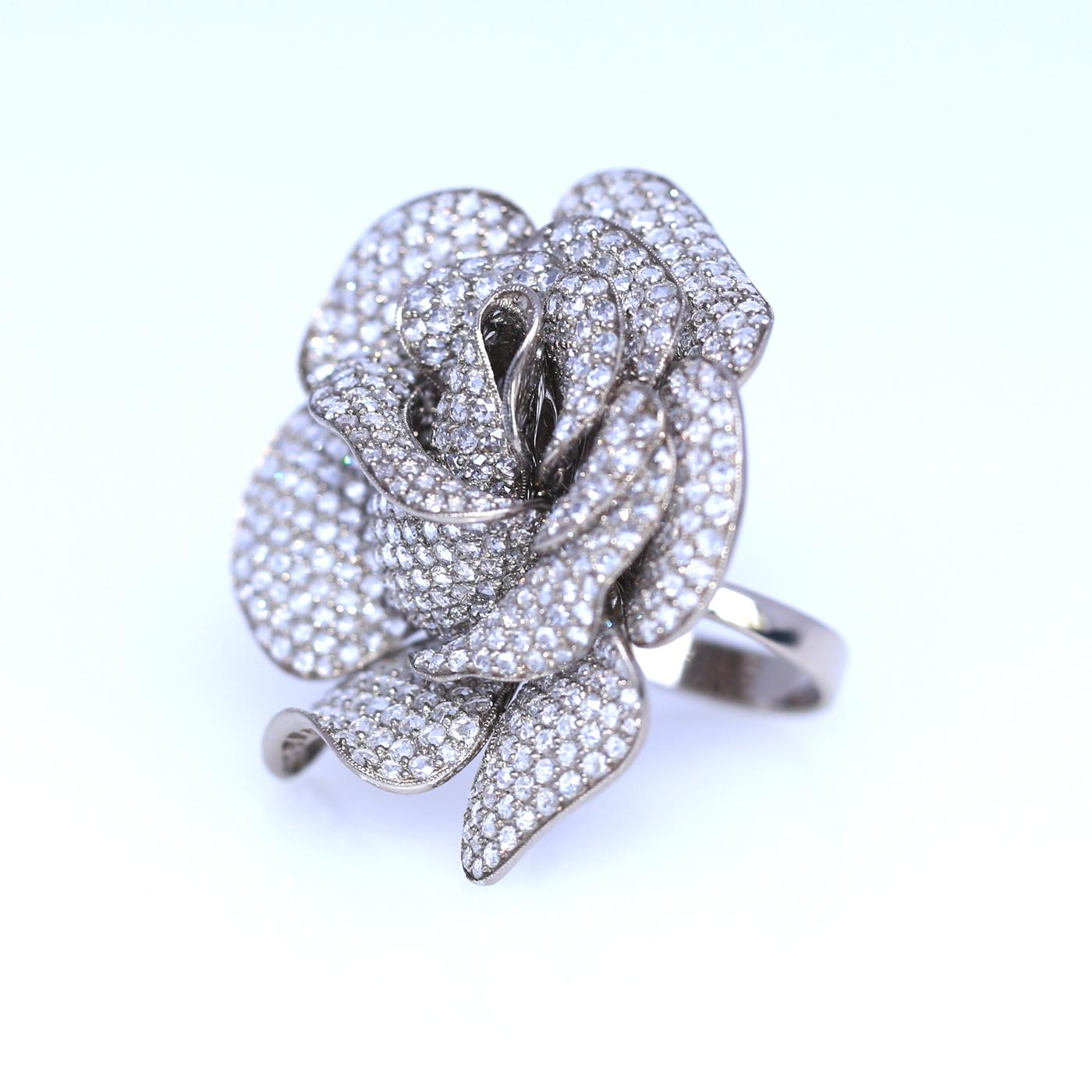 18K White Gold Ring and Brooch Rose Flower fully consist of fine Diamonds of different sizes. The jeweler craft is just outstanding! Diamonds are fixed with no visible casting. Rose flower petals are delicately crafted to mimic the real flower.