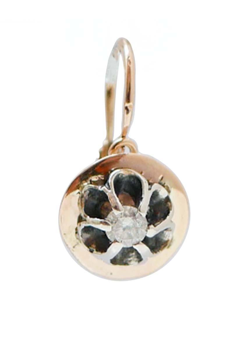 Retrò earrings in 9 kt rose gold and silver structure mounted with a diamond.
These earrings were totally handmade by Italian master goldsmiths and they are in perfect conditions.
Diamonds 0.38 ct
Total Weight 3.00 gr
RF  *GGGU

For any information,