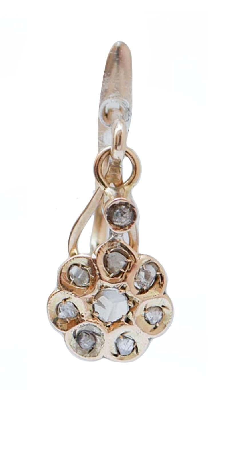 Orecchini Retrò con struttura in oro rosa 9 kt e diamanti.
Diamanti 0,26 ct
Peso totale 3.90 gr
RF  +RCI

Per qualsiasi informazione, non esitare a contattare il venditore attraverso il centro messaggi.