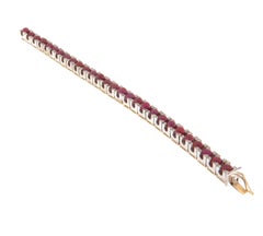 Bracciale in oro giallo 14 carati con diamanti e rubini