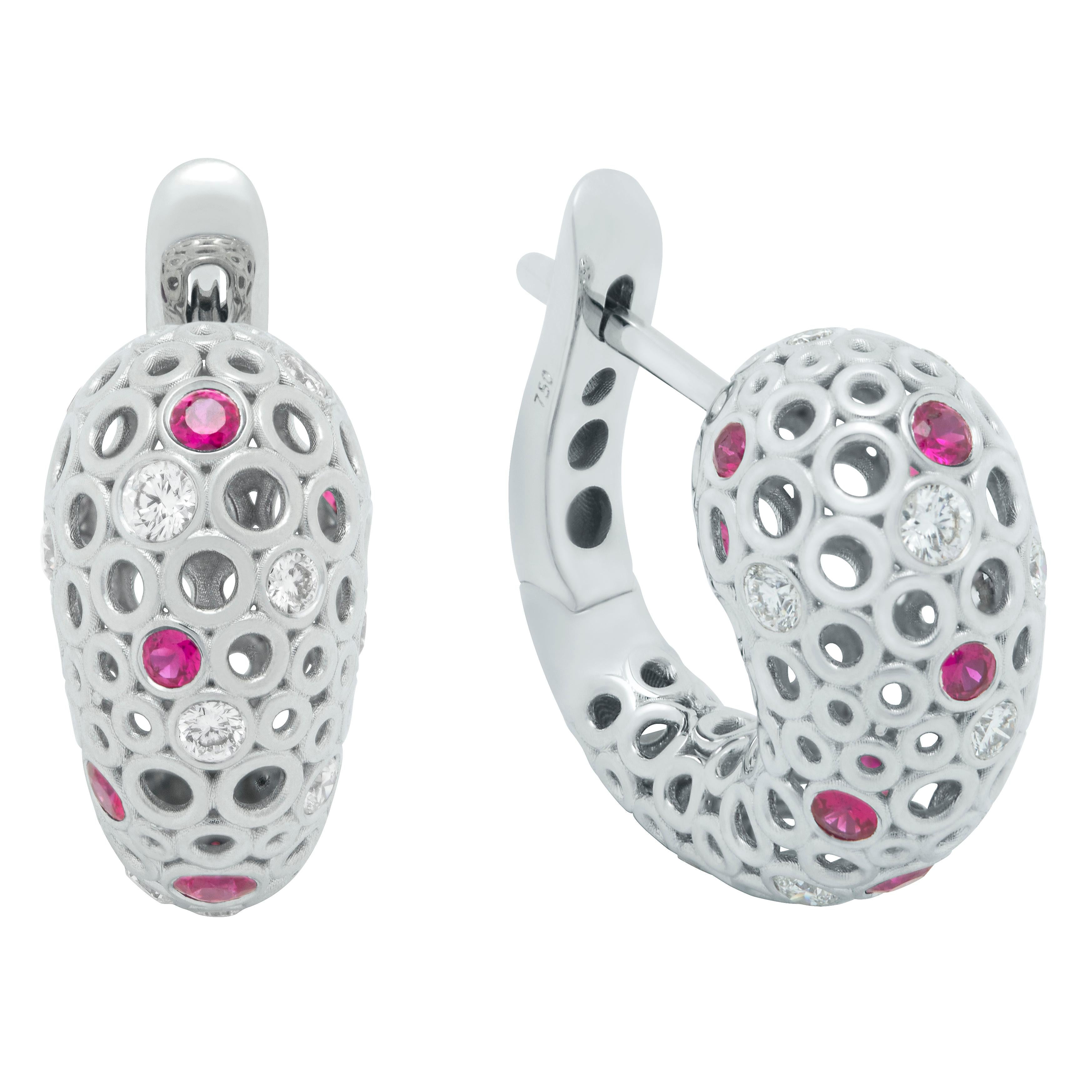 Diamonds Rubies 18 Karat White Gold Bubble Earrings
Incredibly light and airy Earrings from our Bubbles Collection. White 18 Karat Gold is made in the form of variety of small bubbles, some of which have 18 Rubies and 22 Diamonds setted. Instant
