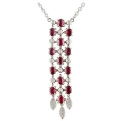 Collier pendentif en or blanc 18 carats, diamants, rubis