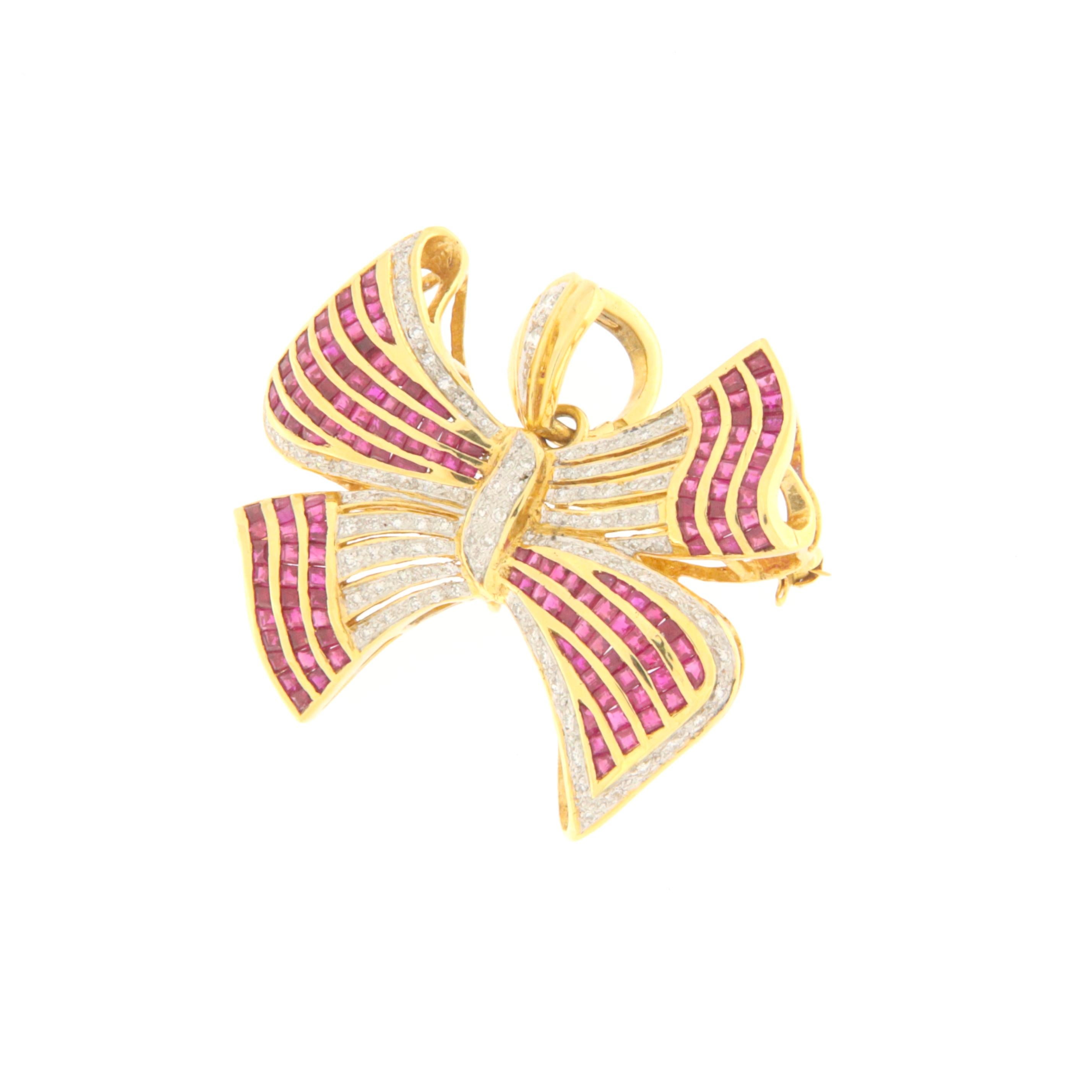 Amazing bow 18 karat yellow gold brooch and pendant. Butterfly Handmade by our craftsmen assembled with diamonds and rubies

Bow total Weight 19.10 grams
Rubies total weight 4.15 karat
Diamonds weight 1.30 karat