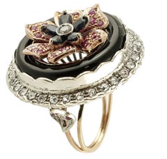Diamonds Rubies Australian Blue Sapphire Onyx Rose Gold and Silver Flower Ring
