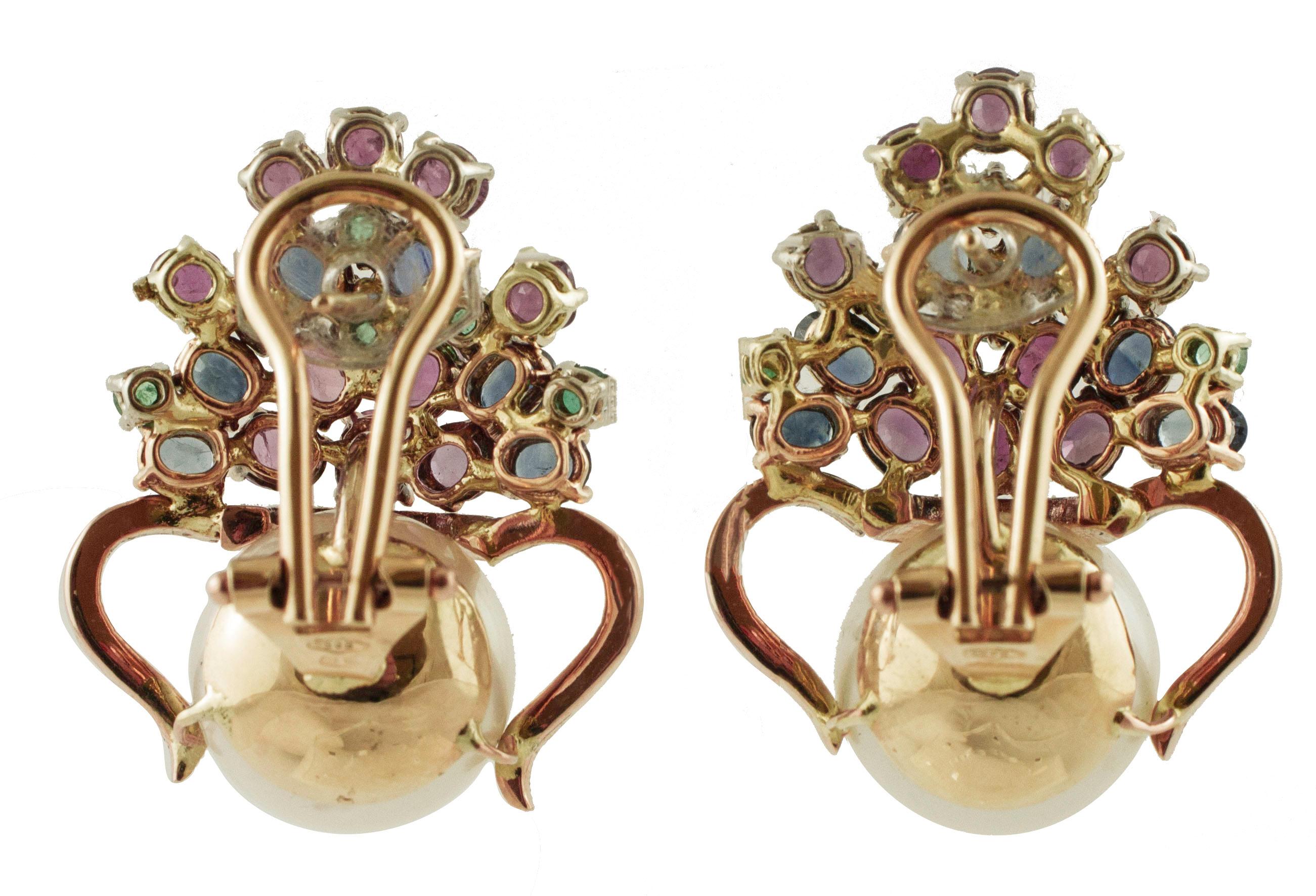 Unique fashion design clip-on earrings with planter shape in 14K rose gold structure mounted at the top with 8.29 ct of rubies, emeralds and blue sapphires that representing the flowers into the pot and at the bottom there are 6.60 g of white pearls