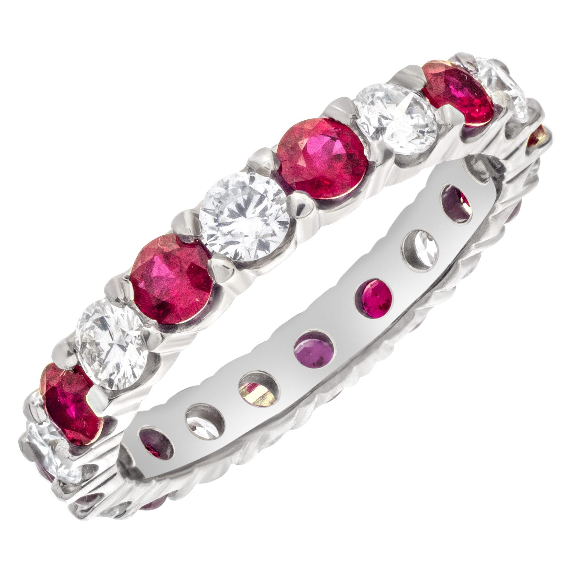 Diamonds & rubies eternity band with 1.50 carats in round brilliant full cut G-H color, SI clarity diamonds and 1 carat in round cut rubies set in 18k white gold. Size 7  This Eternity Band ring is currently size 7 and some items can be sized up or