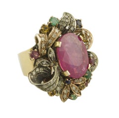 Diamanti Rubini Smeraldi Zaffiri blu e gialli Anello in oro rosa e argento