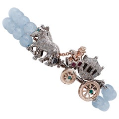 Diamonds Rubies Emeralds Sapphire Aquamarine 9 Gold and Silver Carriage Bracelet