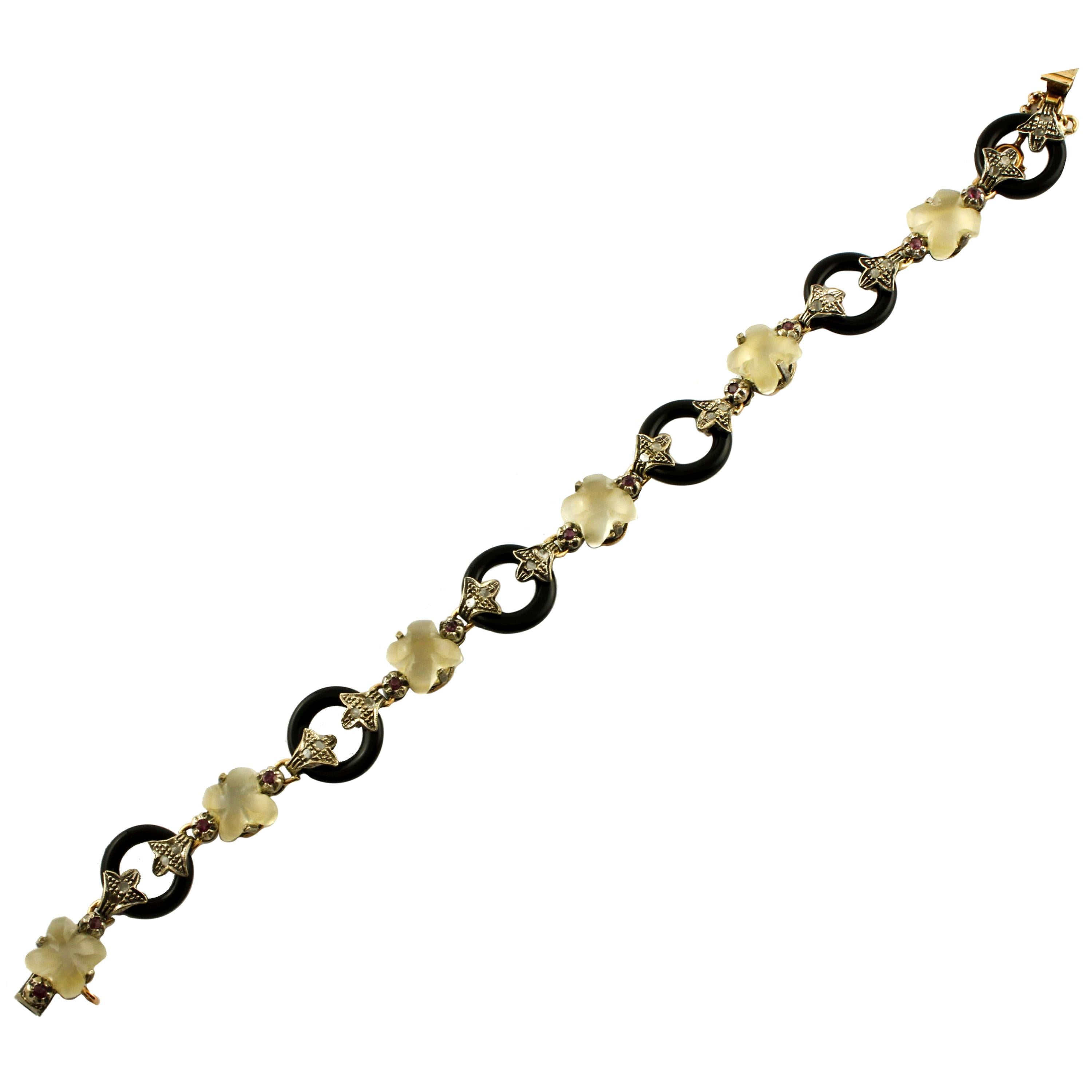 Diamantes Rubíes Piedra lunar Flores Ónice Anillos Oro rosa y plata Pulsera de eslabones