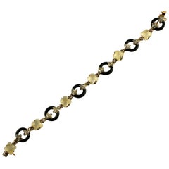 Diamonds Rubies Moonstone Flowers Onyx Rings Rose Gold and Silver Link Bracelet