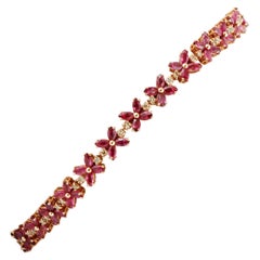 Diamonds, Rubies, Rose Gold Flower Shape Link Tennis Bracelet