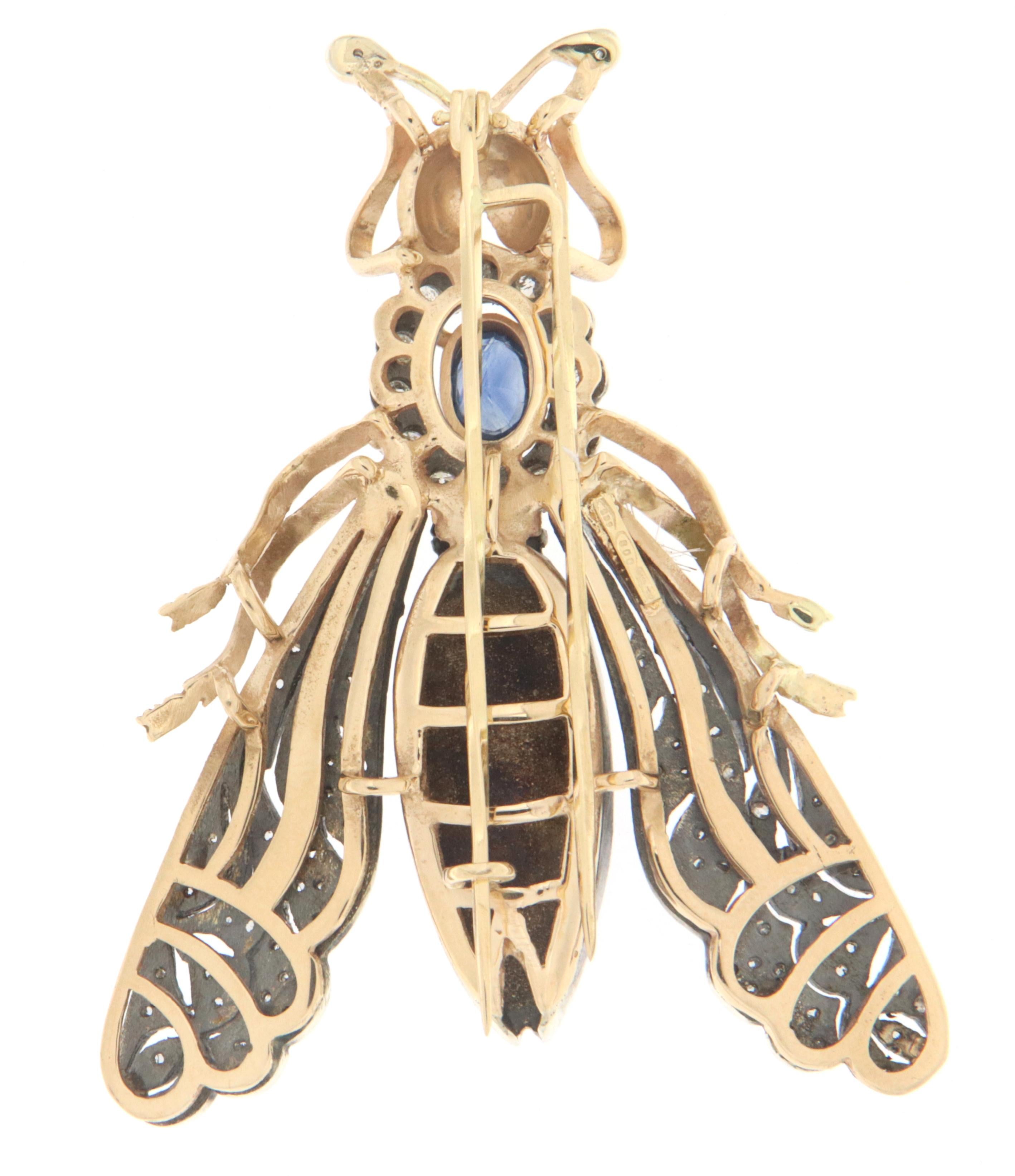 14 karat yellow gold and 800 thousandths silver butterfly brooch. Butterfly Handmade by our craftsmen and assembled with yellow enamel, old cut diamonds,rubies and sapphire.

diamonds weight 1.50 karat
Sapphire weight 1.30 karat
Brooch total weight