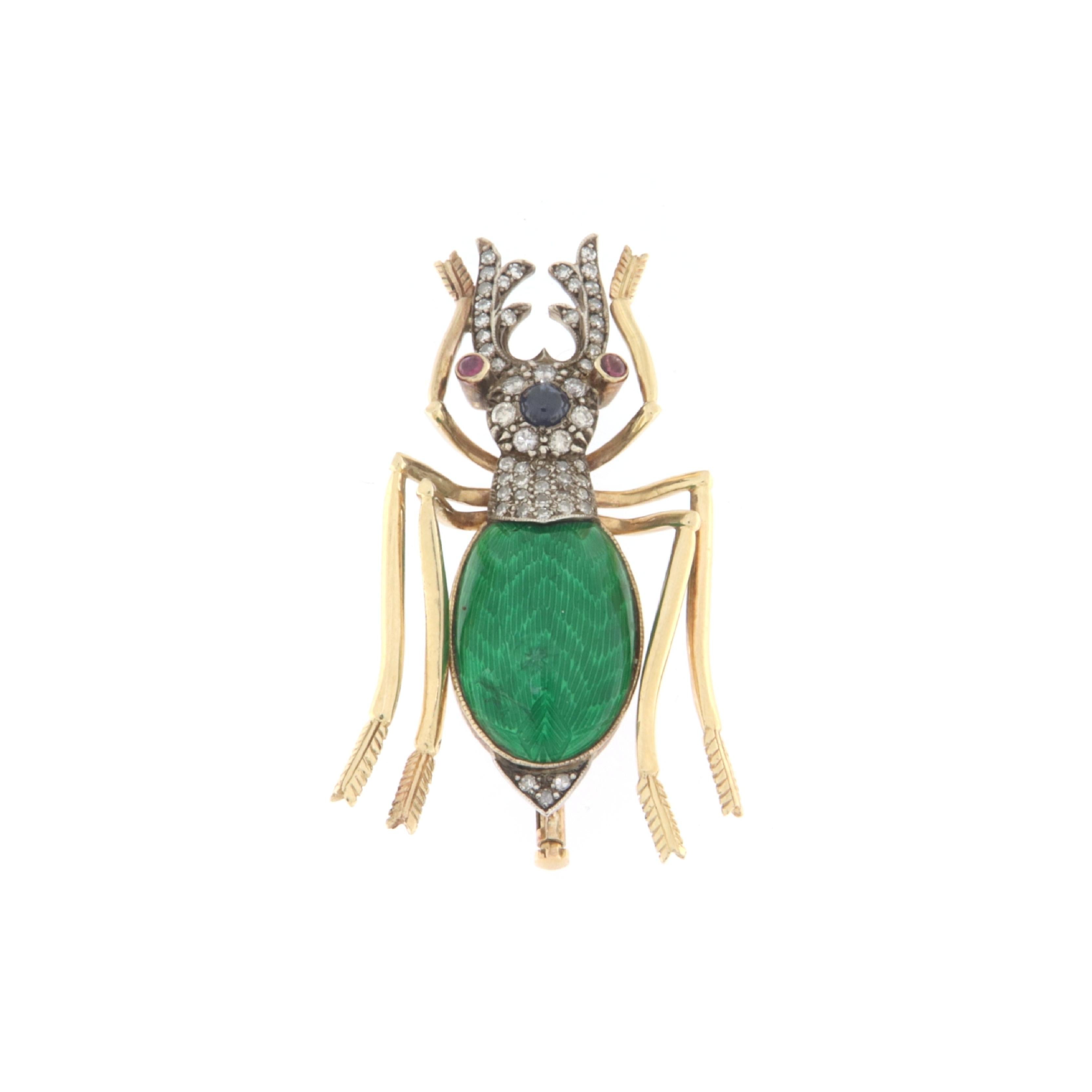 This scarab-shaped brooch is an exemplary showcase of craftsmanship and design, blending fine materials and sparkling gems to create a truly extraordinary accessory. Crafted with 14-karat gold and 800-millesimal silver, this brooch is not just a