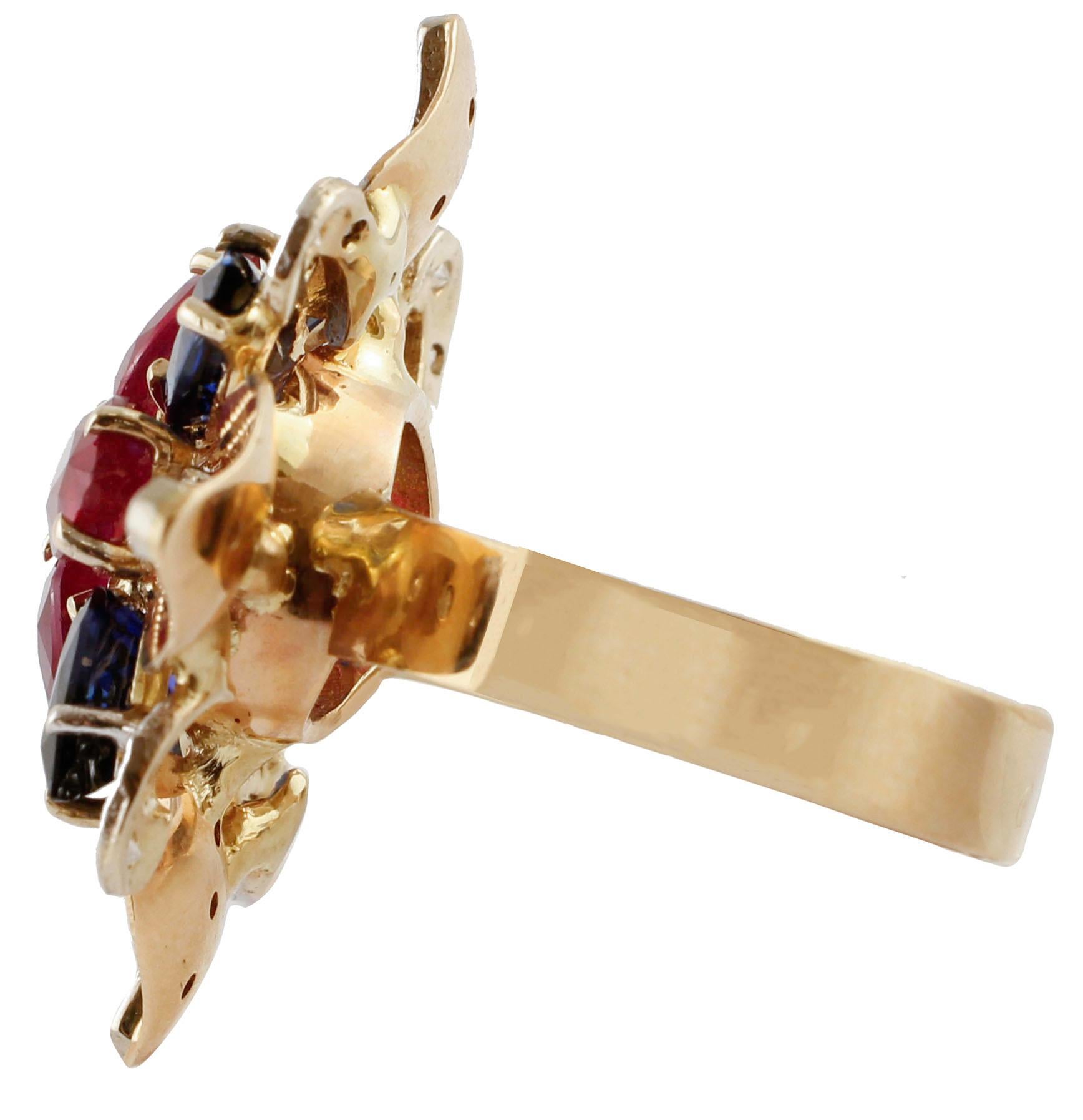 Elegant flower ring in 14 kt rose gold structure, composed of leaves studded with diamonds. In the center, a flower made with drop rubies and drop sapphires.
Diamonds 0.24 ct
Rubies and Sapphires 8 ct
Total weight 10.80 gr
This ring is totally