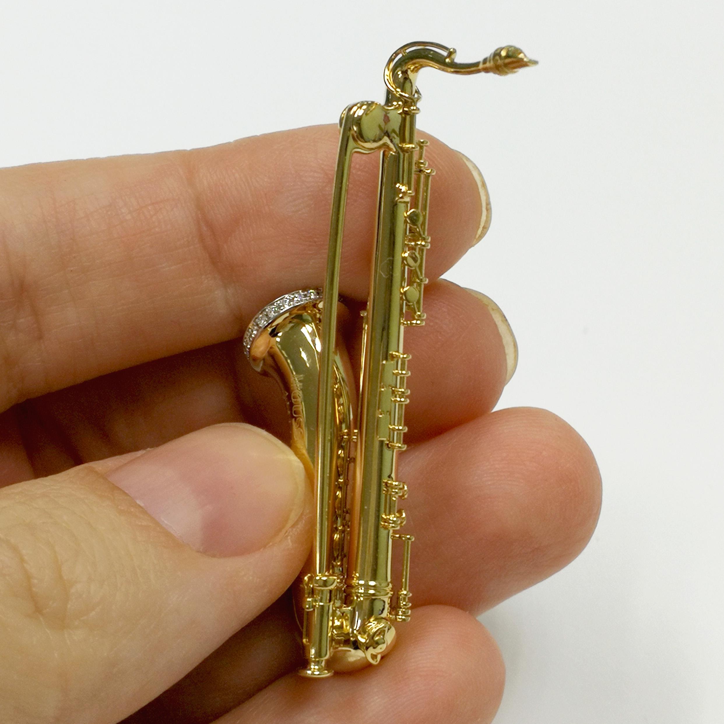 Contemporary Diamonds Rubies Saxophone 18 karat Yellow Gold Brooch For Sale
