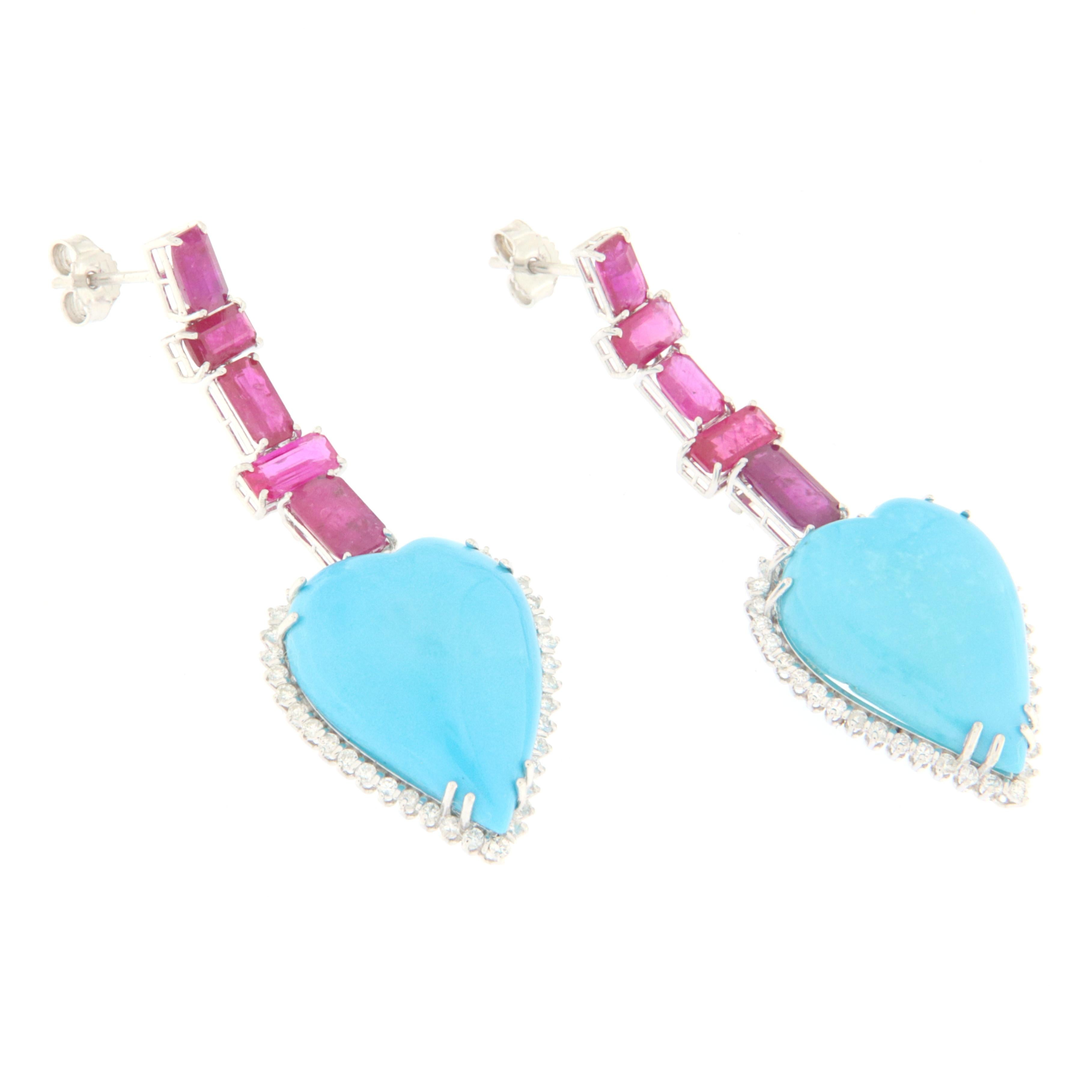 Fantastic earring made entirely by hand by expert master craftsmen.Made of 18 Karat white gold with natural diamonds,rubies and hearts turquoise.
An earring to be exhibited on any occasion, simple but at the same time very impactful, in short, a