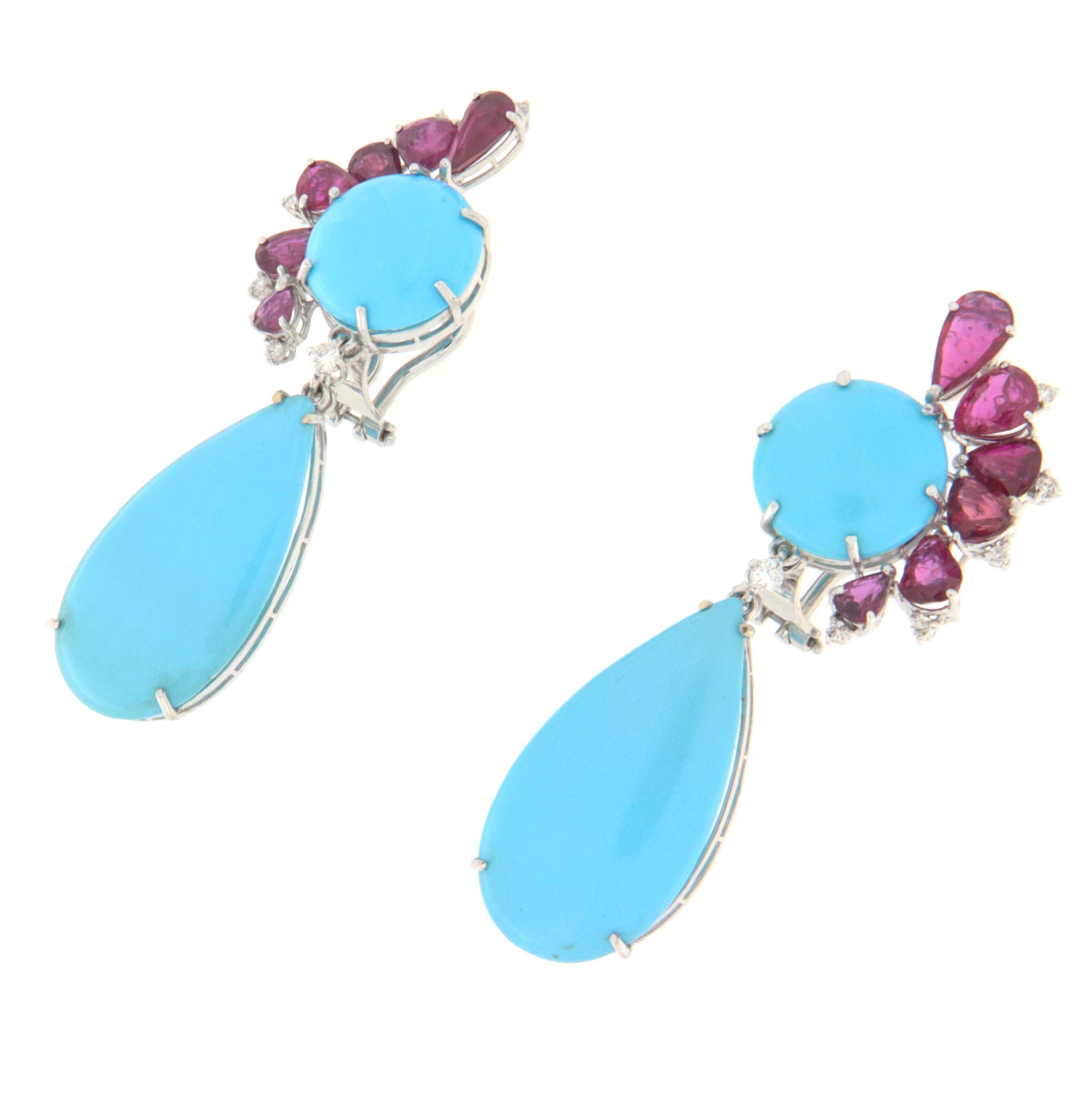 Fantastic earring made entirely by hand by expert master craftsmen.Made of 18 Karat white gold with natural diamonds,rubies and hearts turquoise.
An earring to be exhibited on any occasion, simple but at the same time very impactful, in short, a