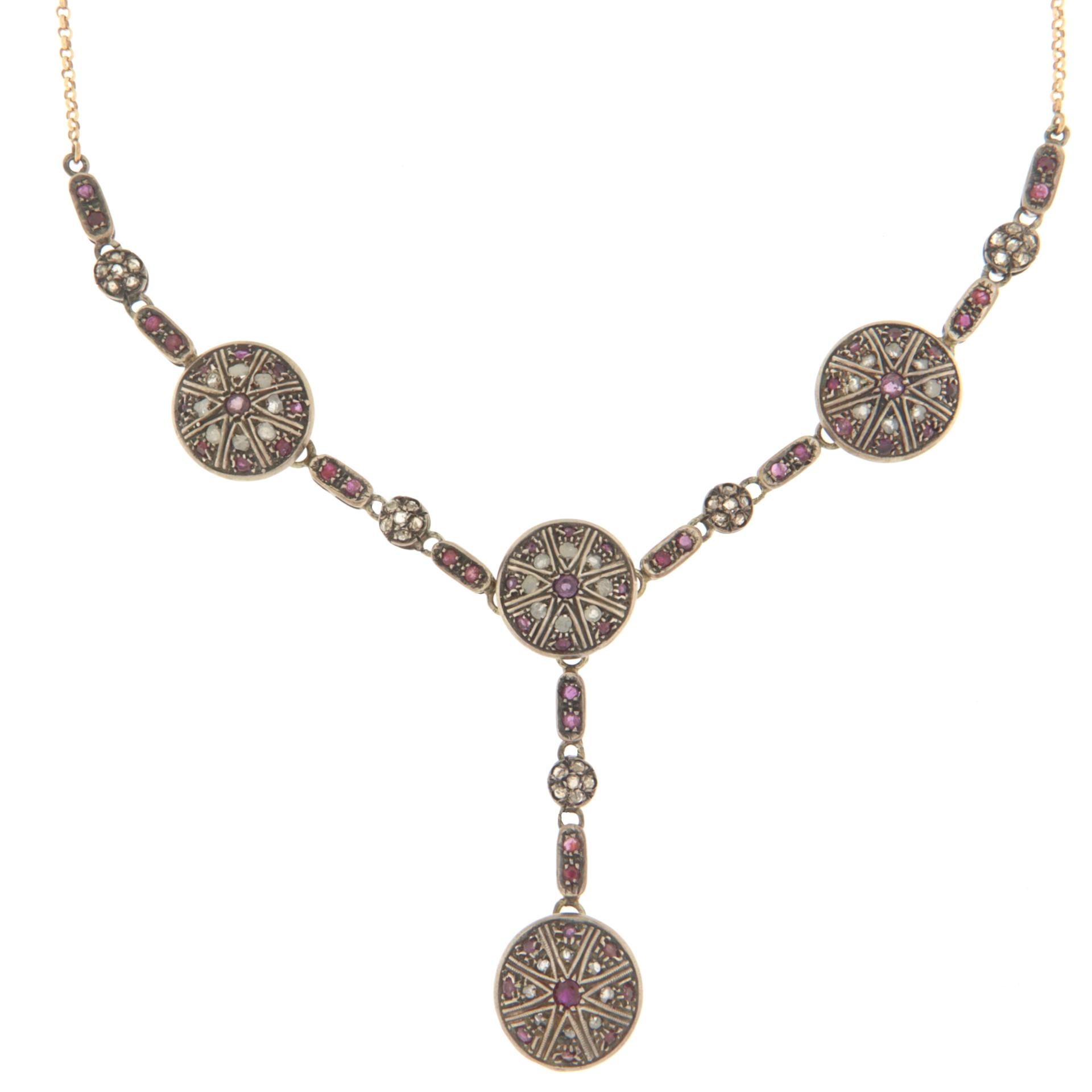 Necklace made in the antique style of the late nineteenth and early twentieth centuries by Neapolitan master goldsmiths.
Set in 14 Karati yellow gold and silver with rose-cut diamonds and rubies set
Special necklace for women who love retro taste or