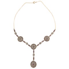 Collana con diamanti e rubini in oro giallo e argento 14 carati