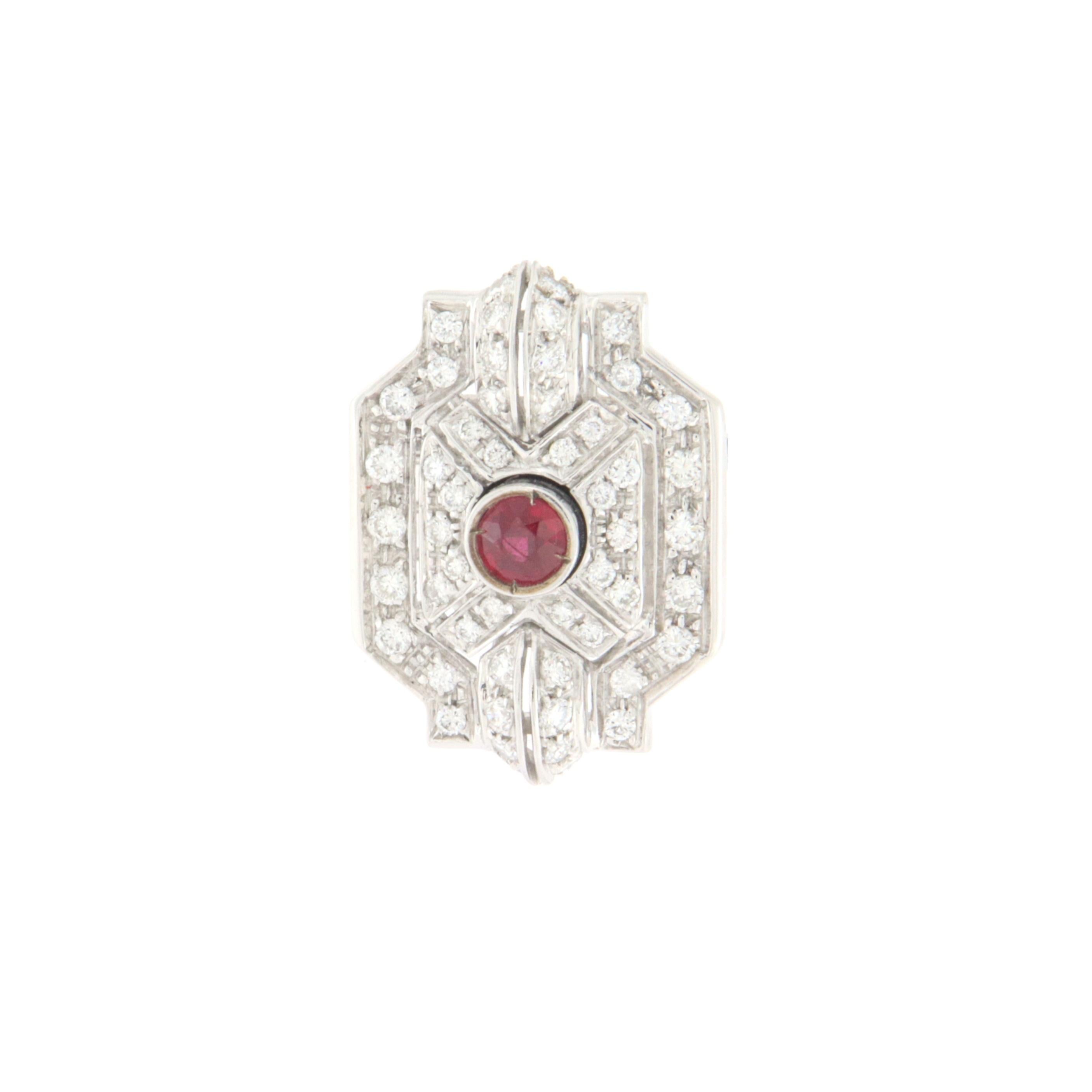 Fantastic 18 karat white gold cocktail ring.Handmade by our artisans assembled with ruby and diamonds

Ring weight 11.50 grams
Diamonds weight 1.35 karat
Ruby weight 0.51 karat
Ring size 7.75 US 16 ITA 
(all rings are can be resized)
