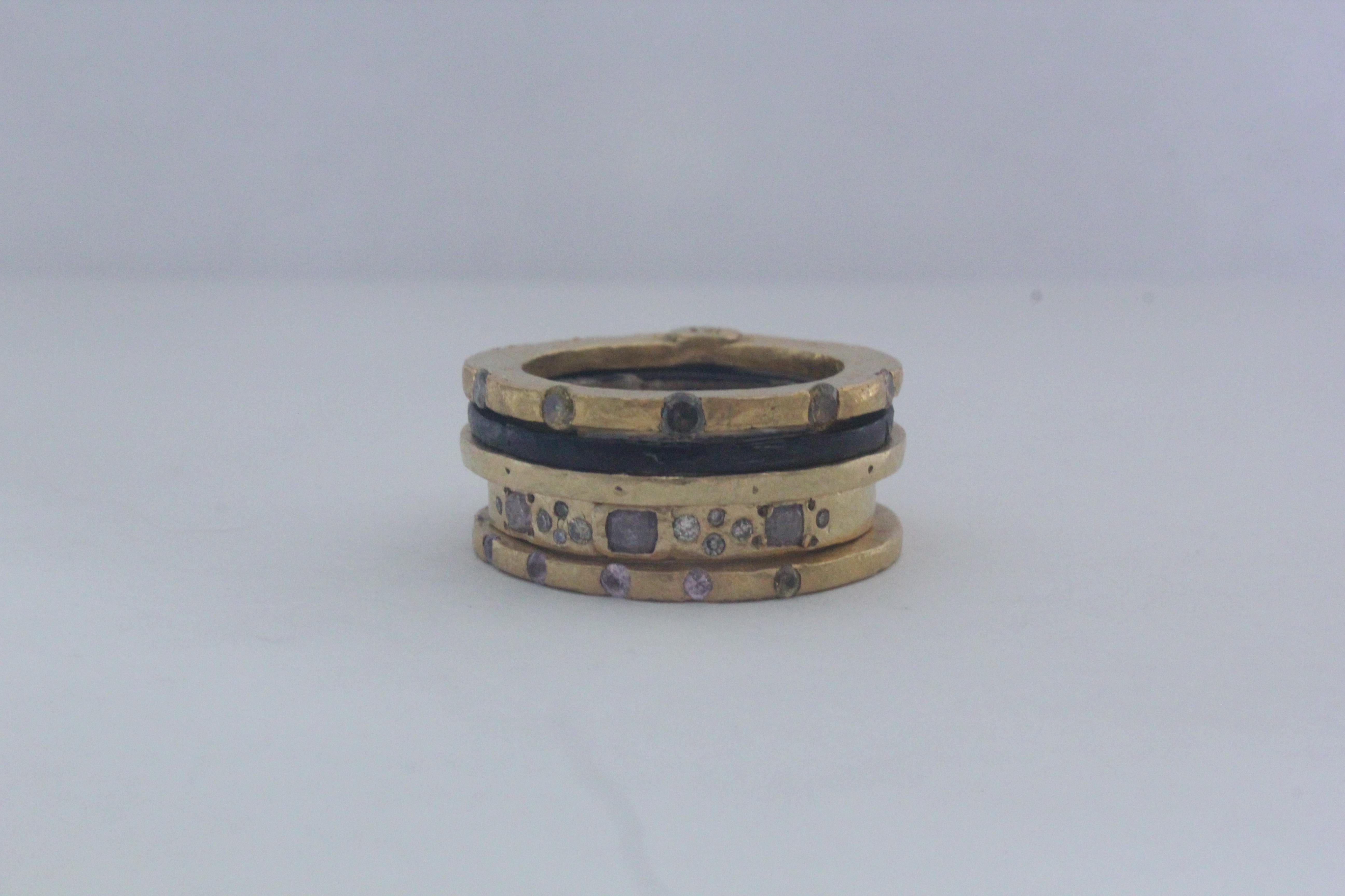 A bridal or a wedding band. Fancy color diamonds and pink sapphires are set in 22k and 18k gold and combined with two sterling silver rings. Set of six rings in total. Simplicity Stack #1 modern design.

This stack consists of 18K Large Disk +