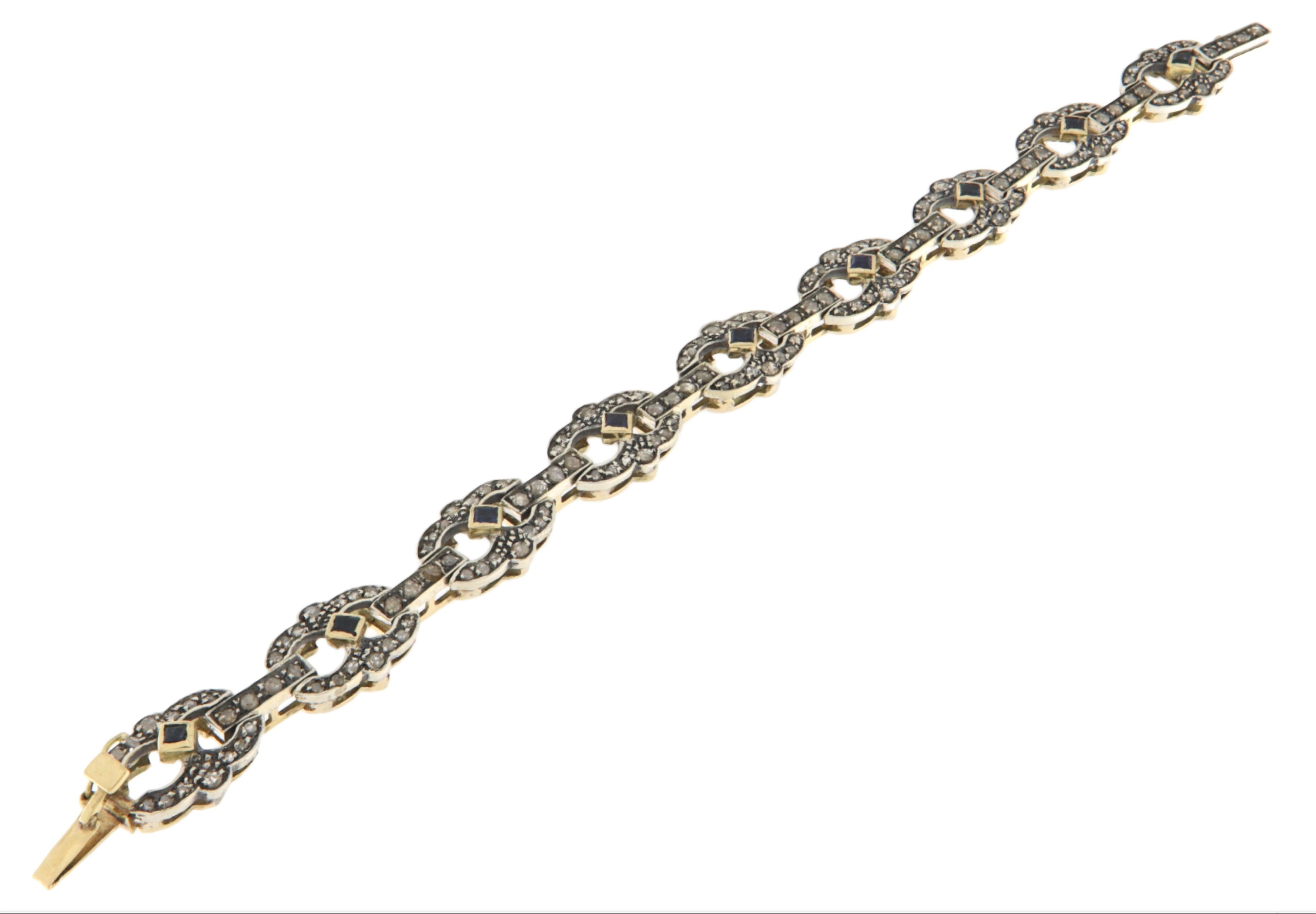 Elegante e raffinato, questo bracciale rappresenta un perfetto incontro tra la tradizione orafa e il gusto senza tempo. Realizzato in oro giallo 14 carati e argento 800, si distingue per l'intricata lavorazione e l'armoniosa combinazione di