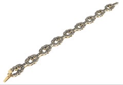 Bracelet manchette en or jaune 14 carats avec diamants et saphirs