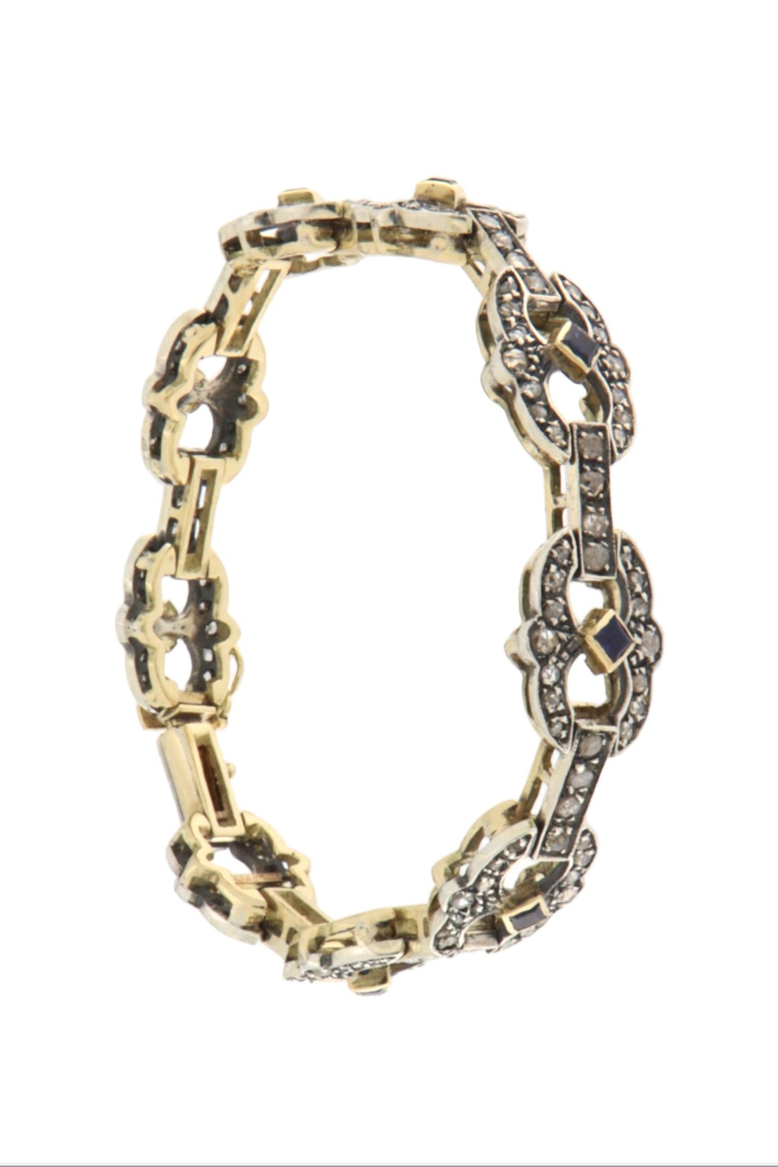 Artigiano Bracciale in oro giallo 14 carati con diamanti e zaffiri in vendita