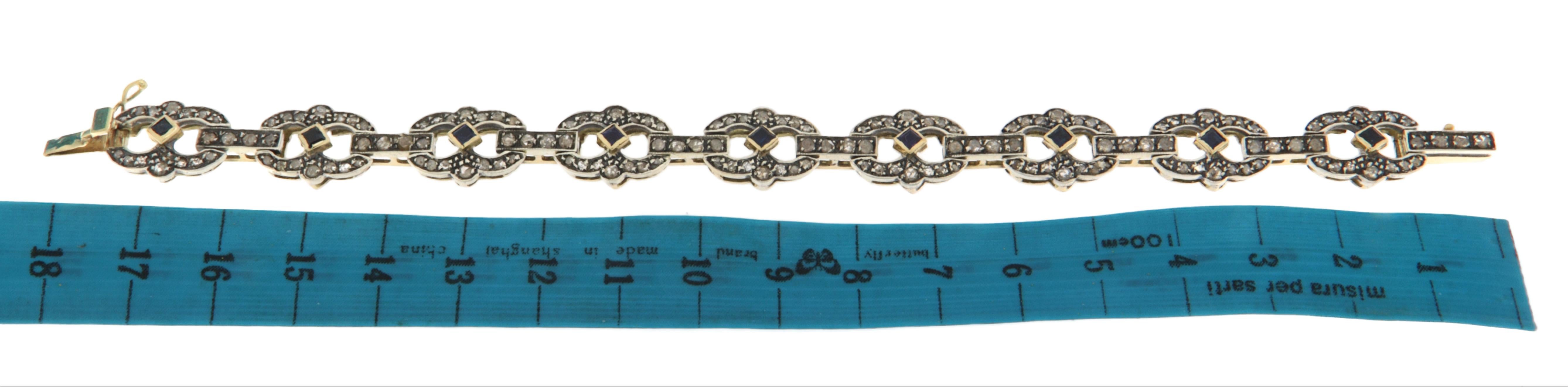 Taglio brillante Bracciale in oro giallo 14 carati con diamanti e zaffiri in vendita