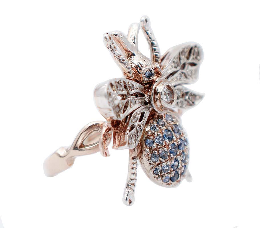 Fashion ring in 9 kt rose gold and silver structure with the design of a fly. The fly's eyes and body are studded with sapphires , while the wings and the neck are studded with diamonds.
Diamonds 0.40 ct
Sapphires 0.90 ct
Total Weight 10.5 gr
Width 
