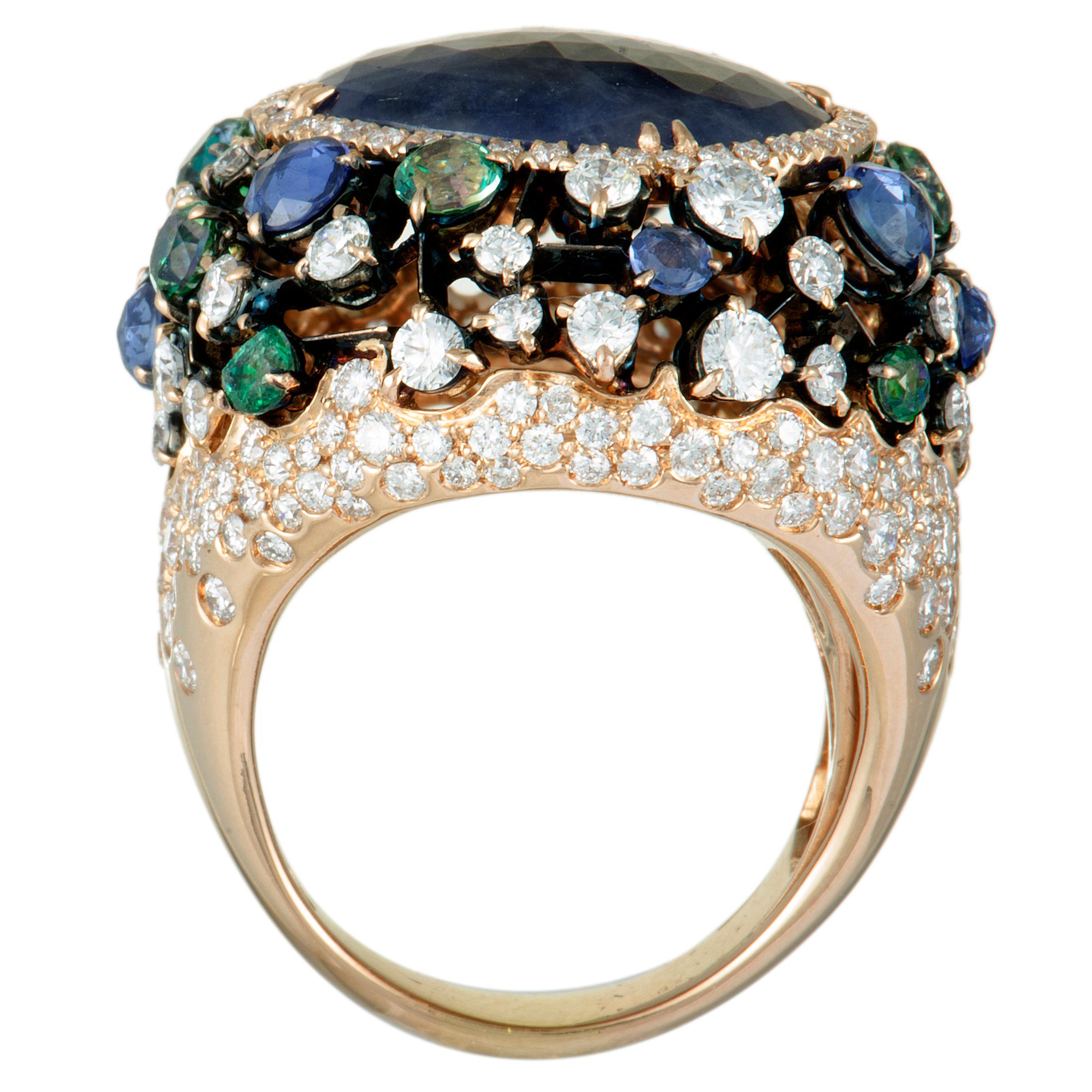 A stunningly resplendent effect is achieved in this magnificent ring by setting an incredibly attractive blend of eye-catching gems against the charmingly radiant surface of gold. The ring is embellished with a plethora of diamonds and sapphires