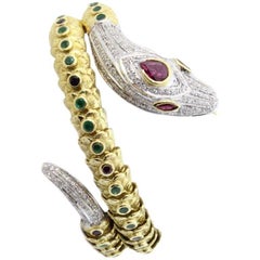 Diamonds Sapphires Emerald Rubies Yellow and White Gold Snake Bracelet