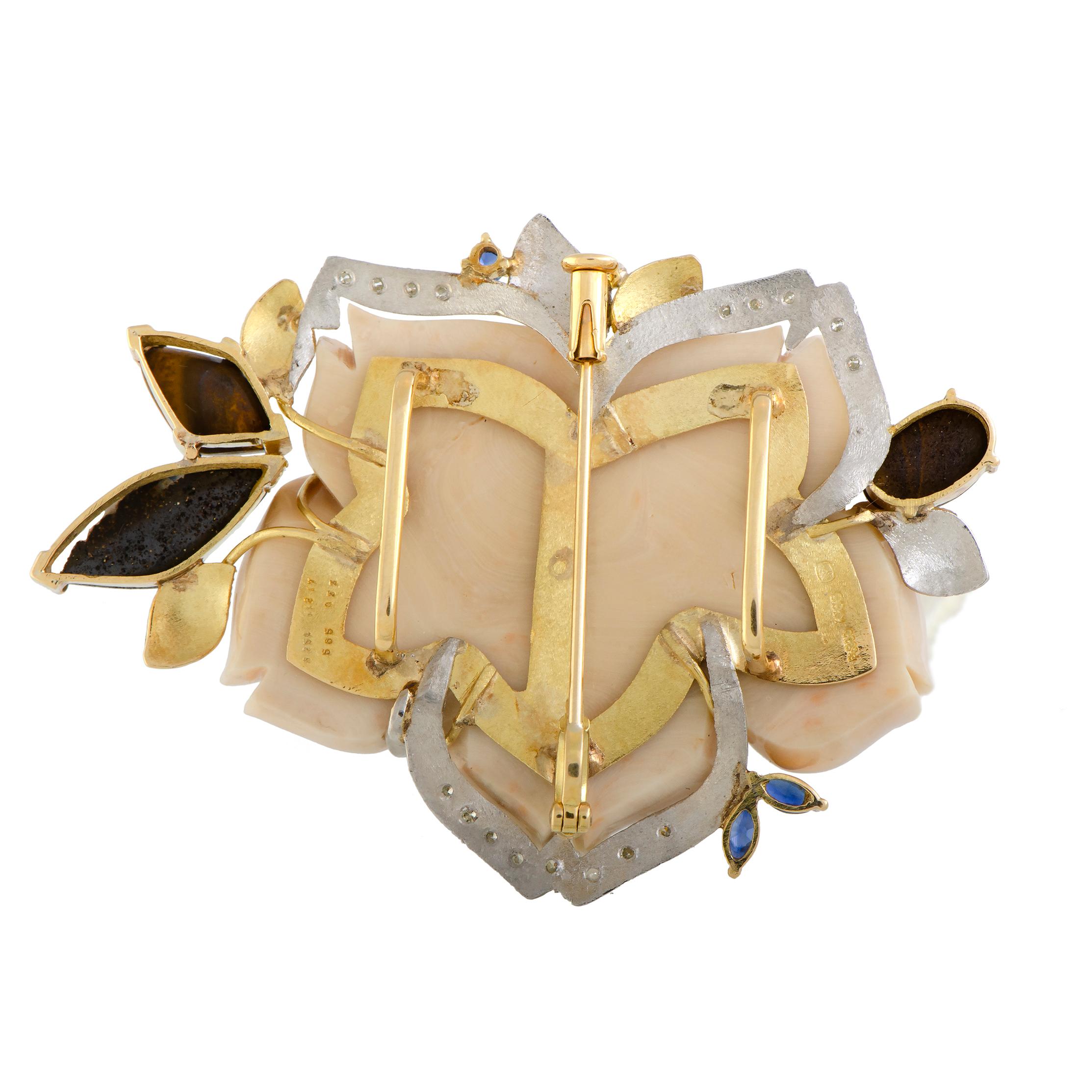 Beautifully designed to depict a delightful flower in a stunningly fashionable manner, this attractive brooch is a definite head-turner that will make any outfit of yours a standout ensemble. The brooch is expertly crafted from platinum and 18K