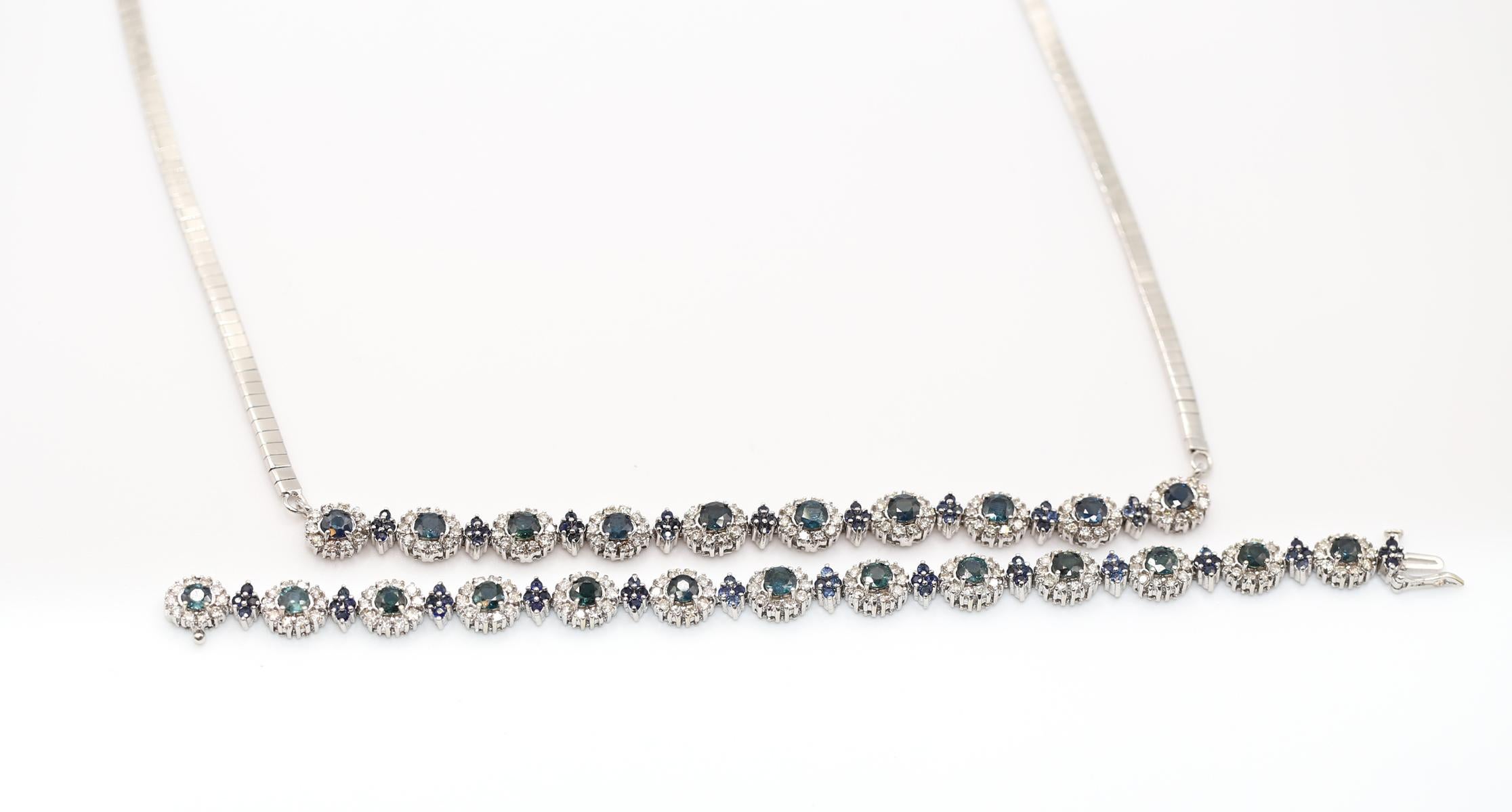 A matching set that comprises a bracelet and a necklace.
Round-cut Sapphires are surrounded by a fine round cut Diamonds. Each set of stones is connected flexibly to the next. So when it is worn on the hand or on the neck the whole jewelry item is