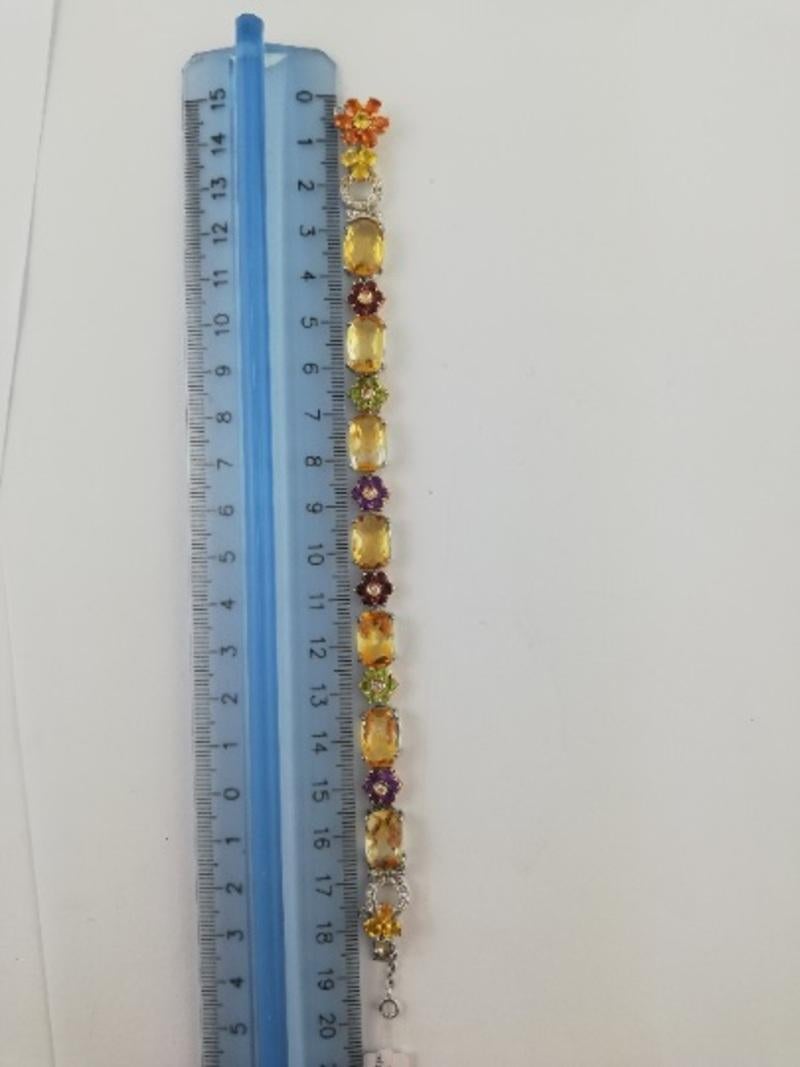 Armband aus 14 Karat Gold mit Diamanten, Saphiren, Topas, Amethysten, Granat, Peridot im Angebot 1