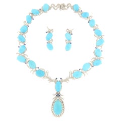 Collier et boucles d'oreilles parure en or blanc 18 carats avec diamants, saphirs et turquoises