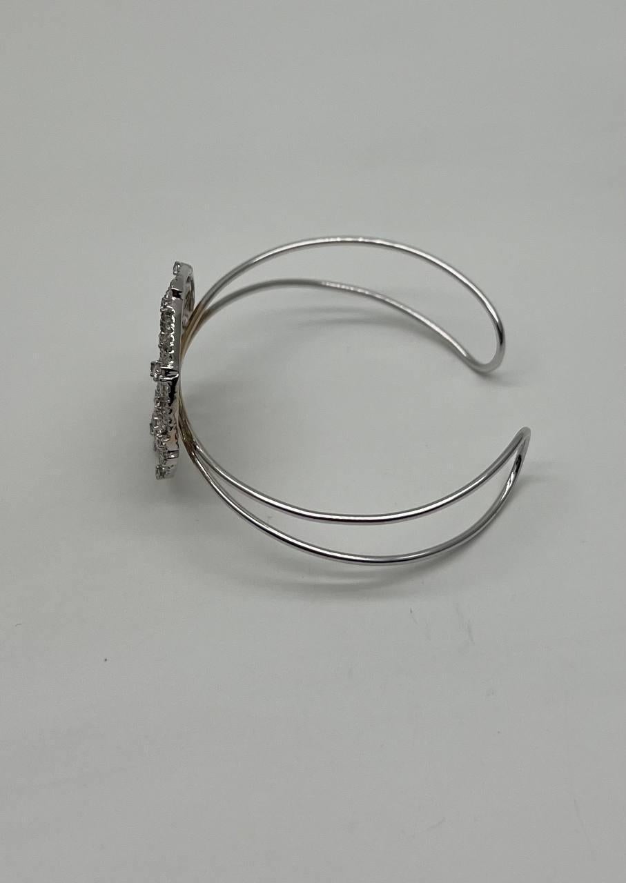 Diamonds Scroll Symbol Motifs Emblem 18K White Gold Statement Bangle Bracelet In New Condition For Sale In Oakton, VA