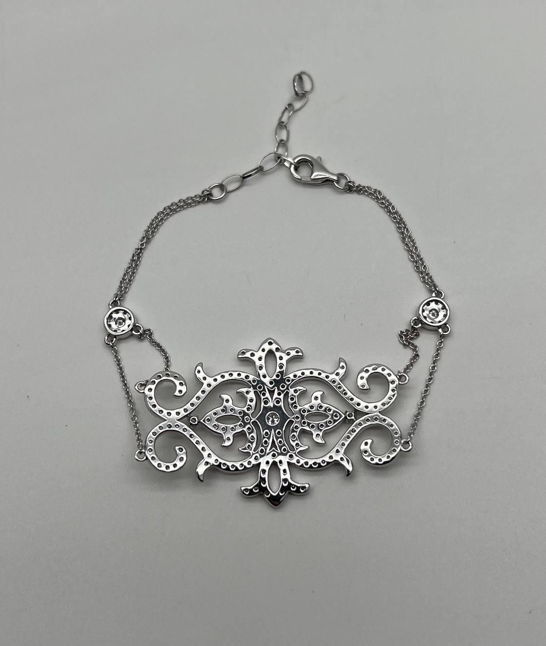Mixed Cut Diamonds Scroll Symbol Motifs Emblem 18K White Gold Statement Chain Bracelet For Sale
