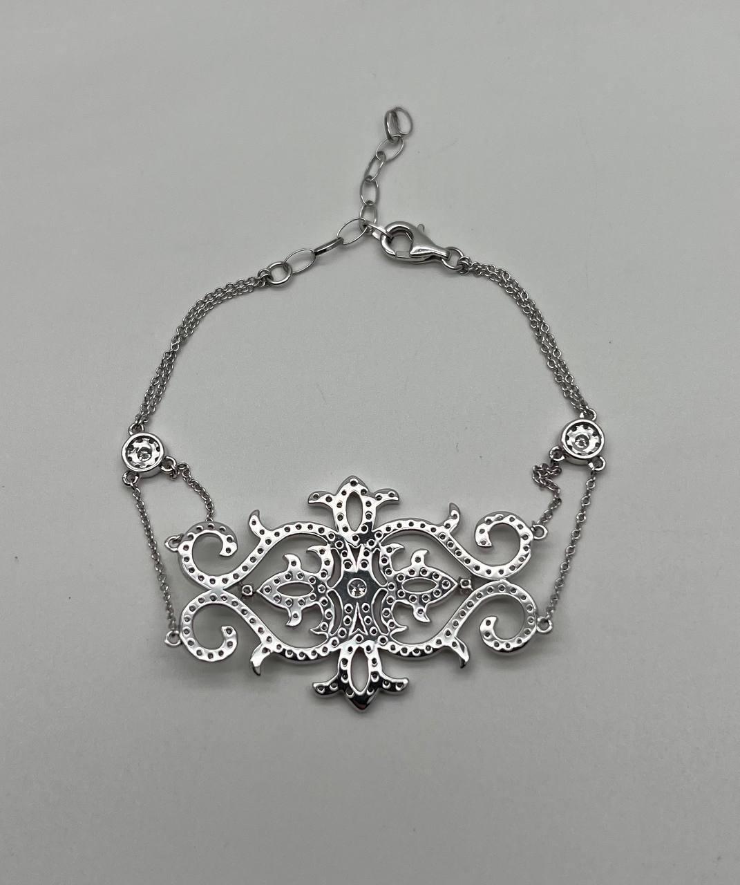 Diamonds Scroll Symbol Motifs Emblem 18K White Gold Statement Chain Bracelet In New Condition For Sale In Oakton, VA