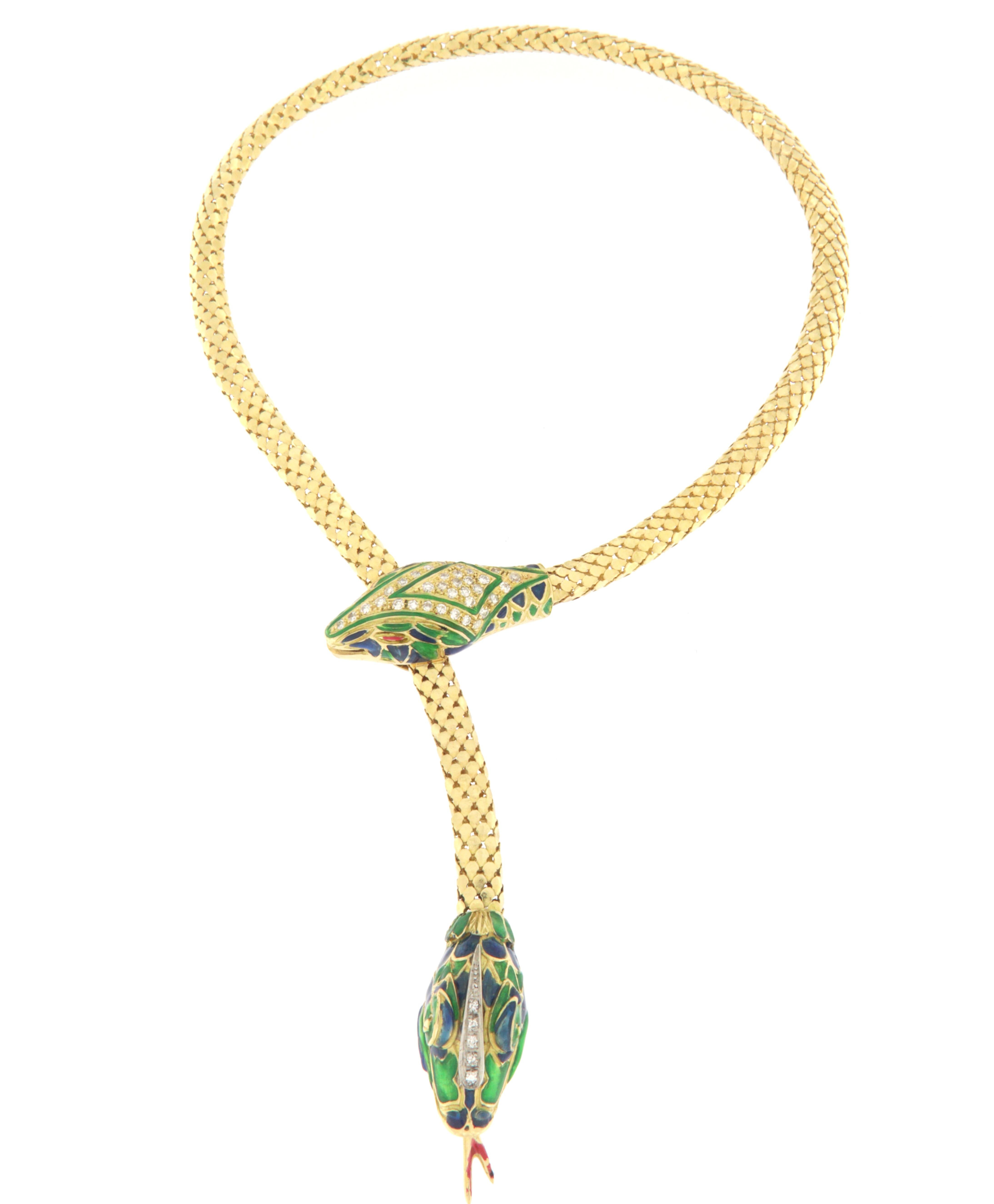 Beautiful snake necklace in 18 karat yellow gold. Handmade by craftsmen assembled with diamonds and green,blue and red enamel.

Diamonds weight 1.15 karat
Necklace total weight 69.10 grams
Necklace open 50 cm (Length)
