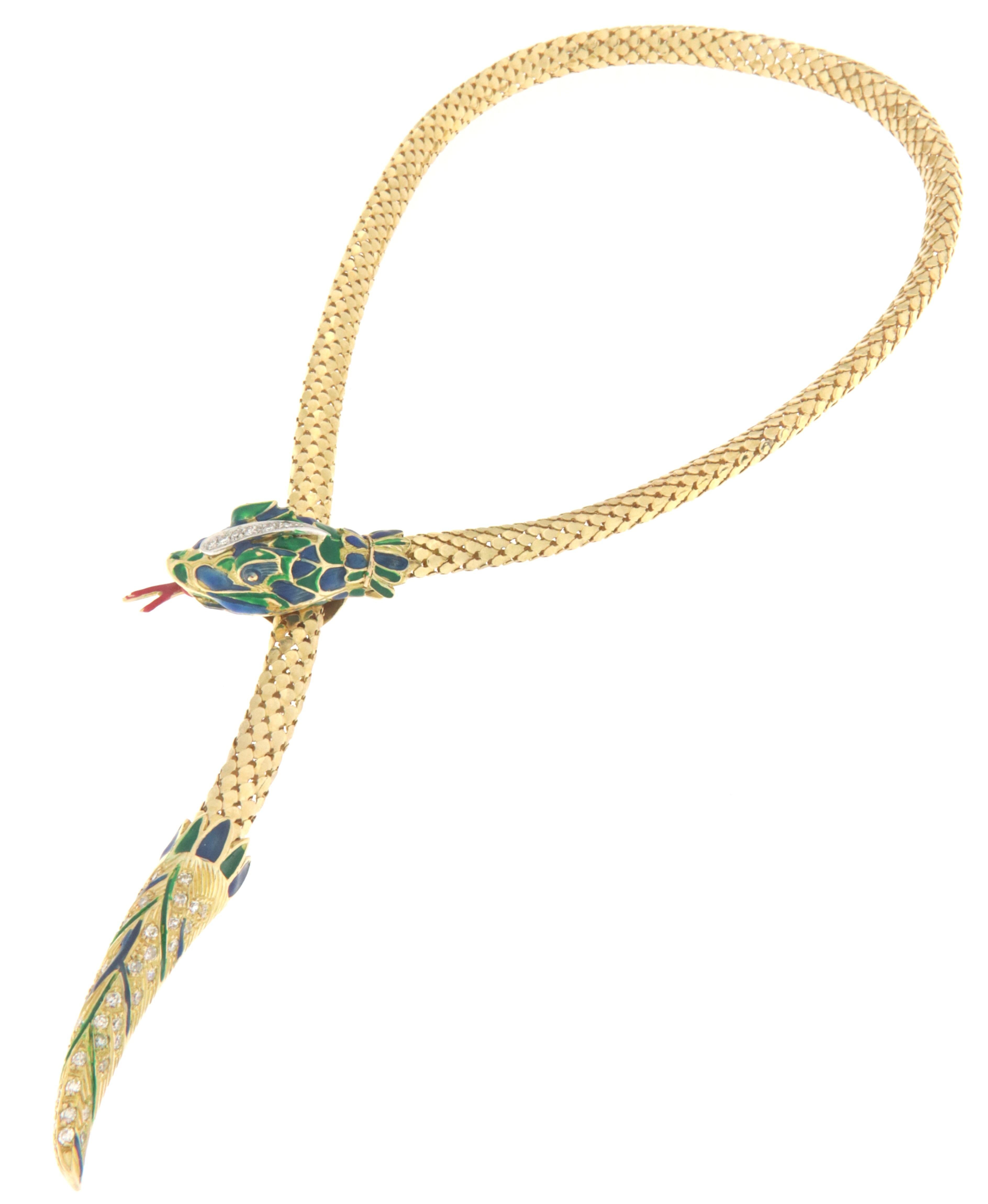 Beautiful snake necklace in 18 karat yellow gold. Handmade by craftsmen assembled with diamonds and green,blue enamel.

Diamonds weight 1.21 karat
Necklace total weight 65.70 grams
Necklace open 52 cm (Length)