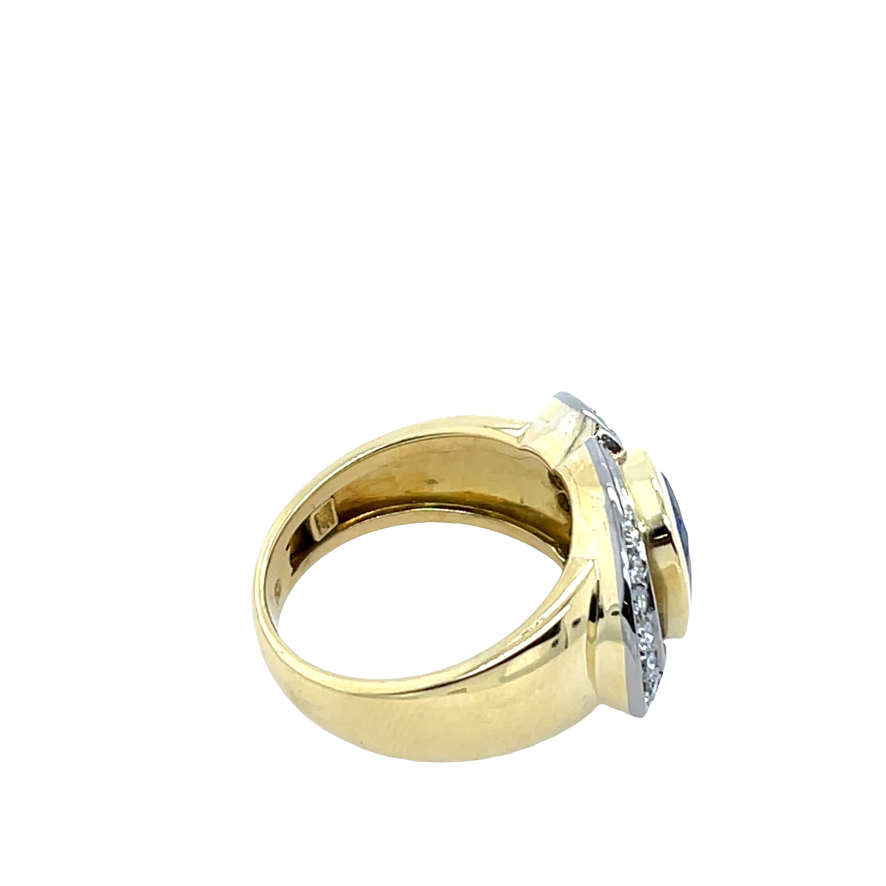 Kleiderring mit Diamanten und Tansaniten, gefasst in 18 Karat Gelb- und Weißgold Damen im Angebot