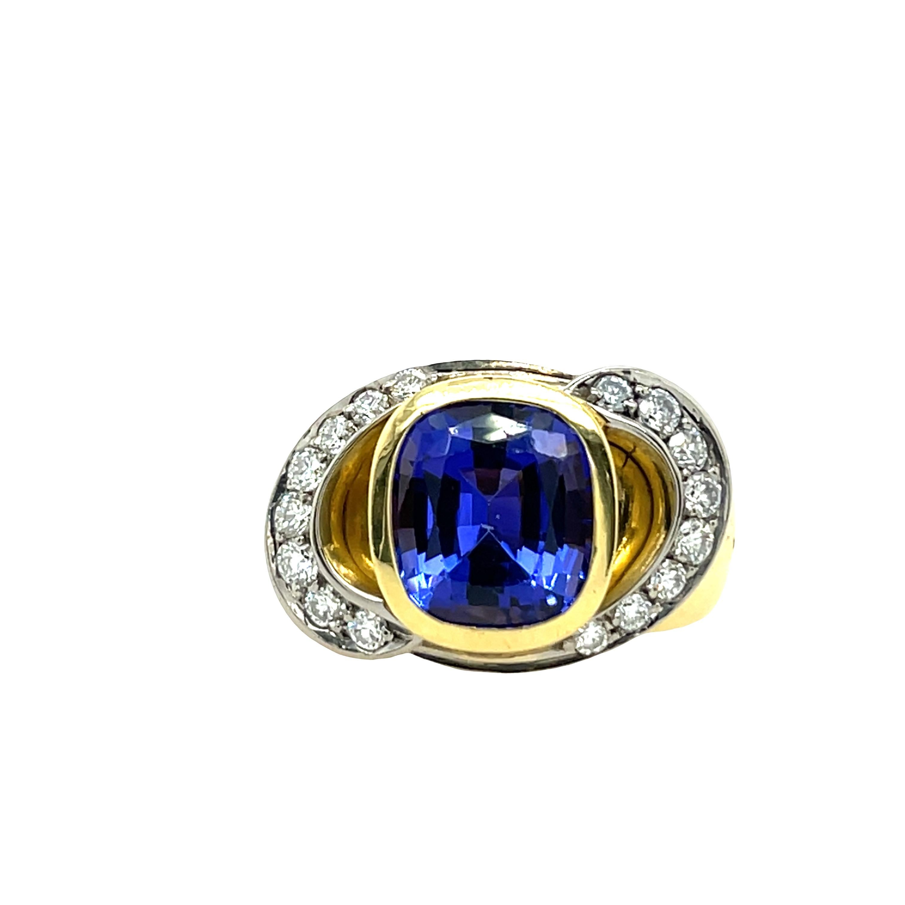 Kleiderring mit Diamanten und Tansaniten, gefasst in 18 Karat Gelb- und Weißgold im Angebot 1